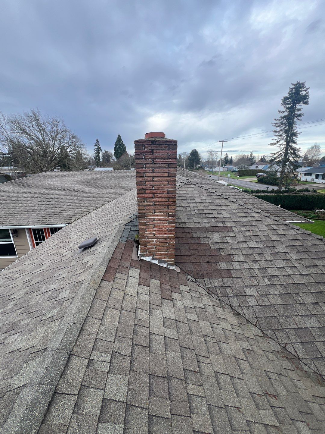 Residential Roofing Installation using IKO Dynasty (Color: Granite Black) by Orezona Building & Roofing Company, Inc.