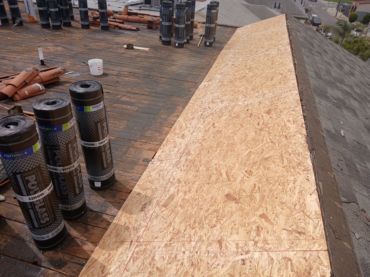 Apartment Building Reroofing using Polyfresko® G Highly Reflective Modified Bitumen Cap Sheet by Hull Brothers Roofing