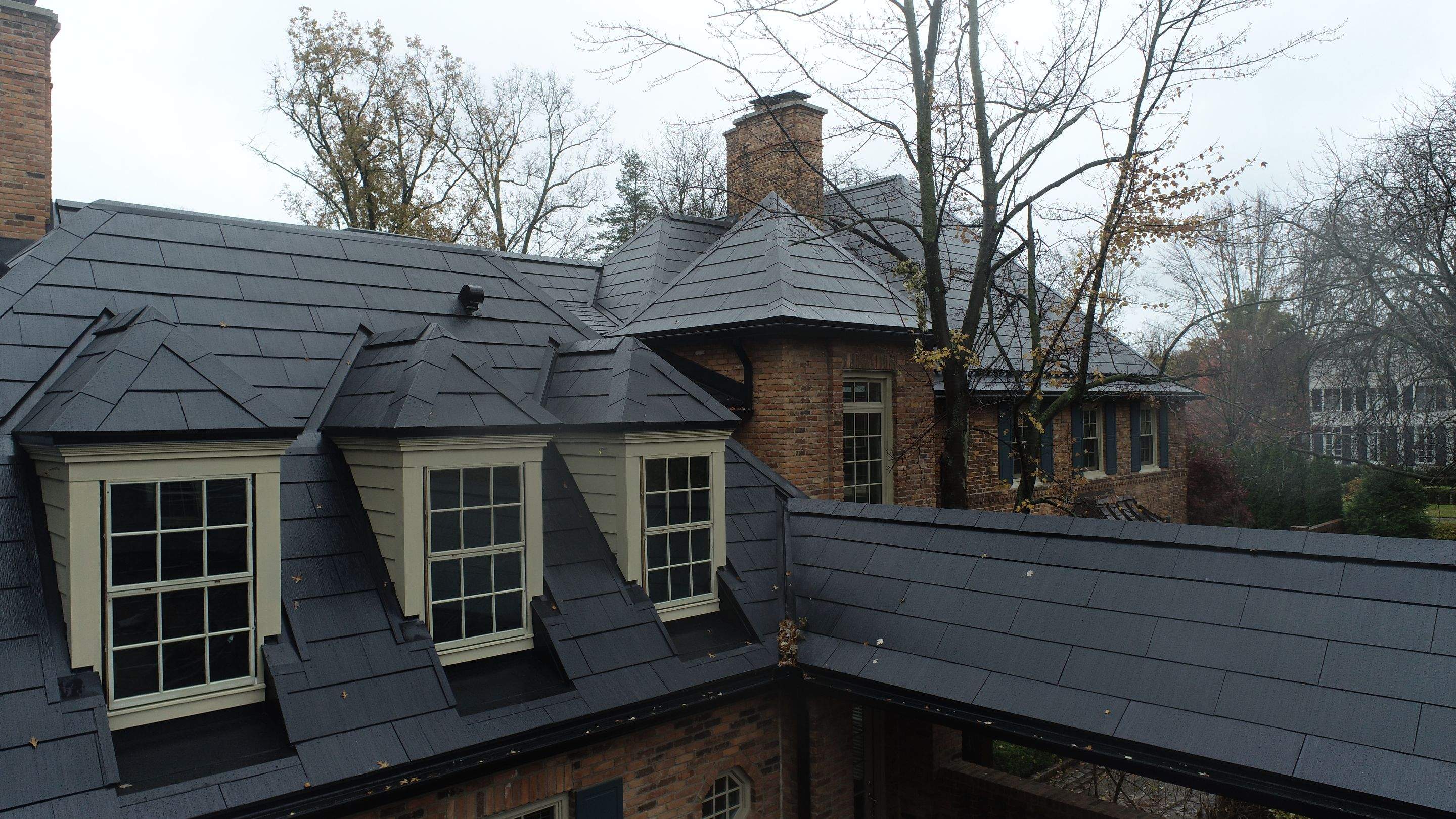 Tesla Solar Roof Replacement  by American Home Contractors