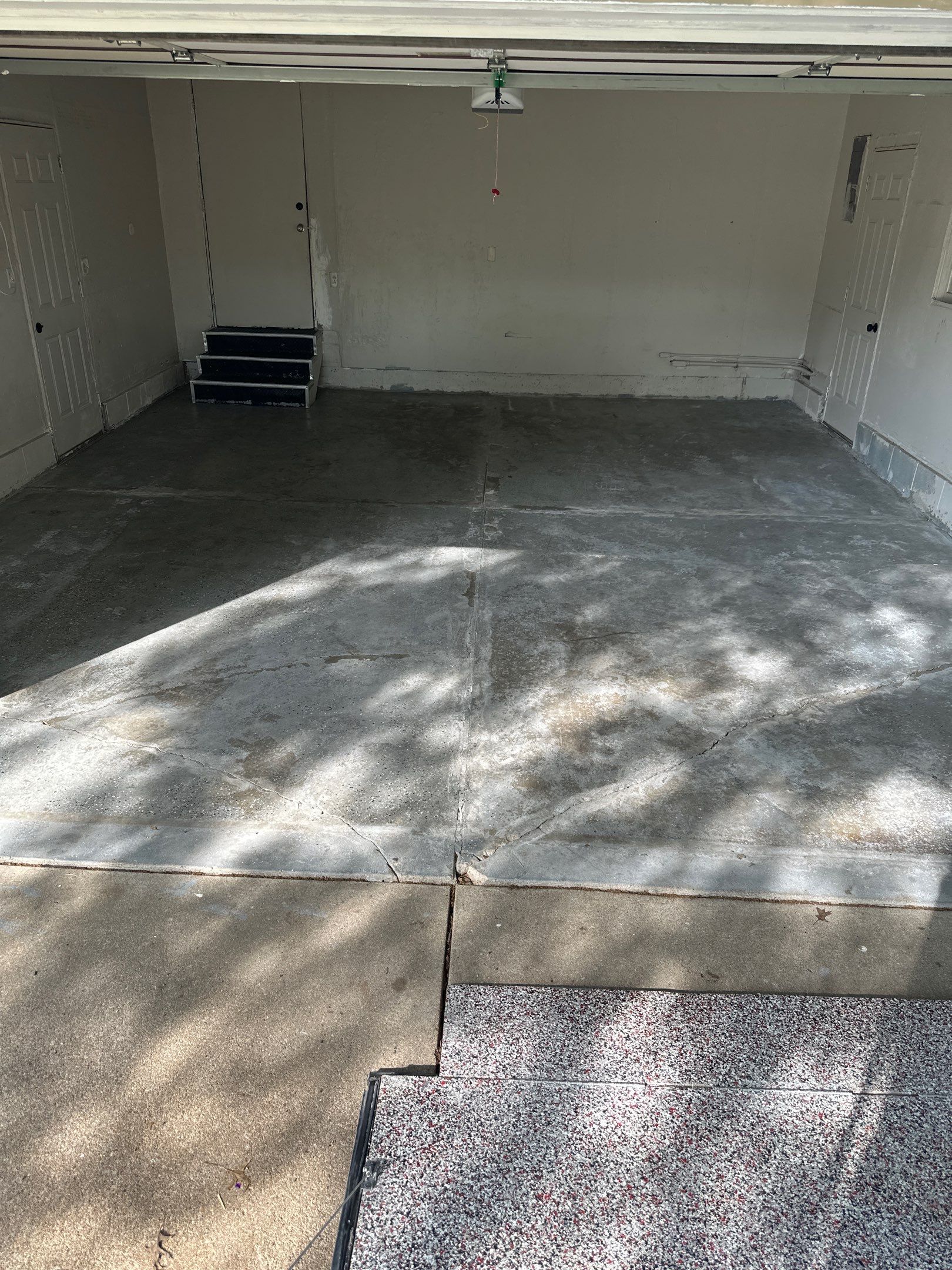 High-Gloss Metallic Epoxy Garage Floor Transformation in Lincoln by Goat Coatings