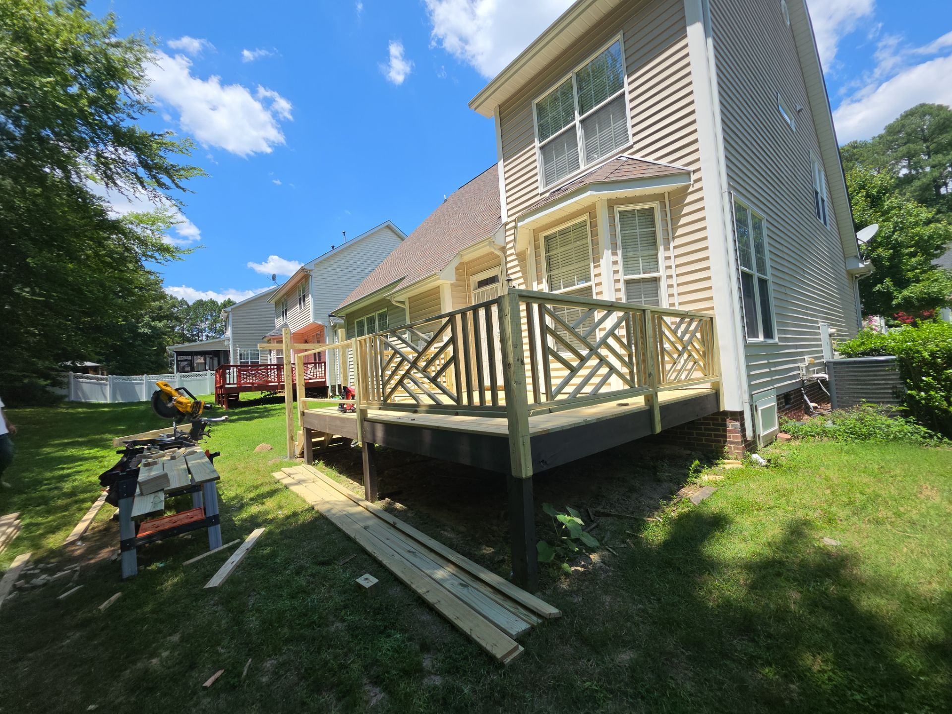 Raleigh Wooden Deck Resurfacing and Decorative Lattice Railing Upgrade by The Remodeling Company