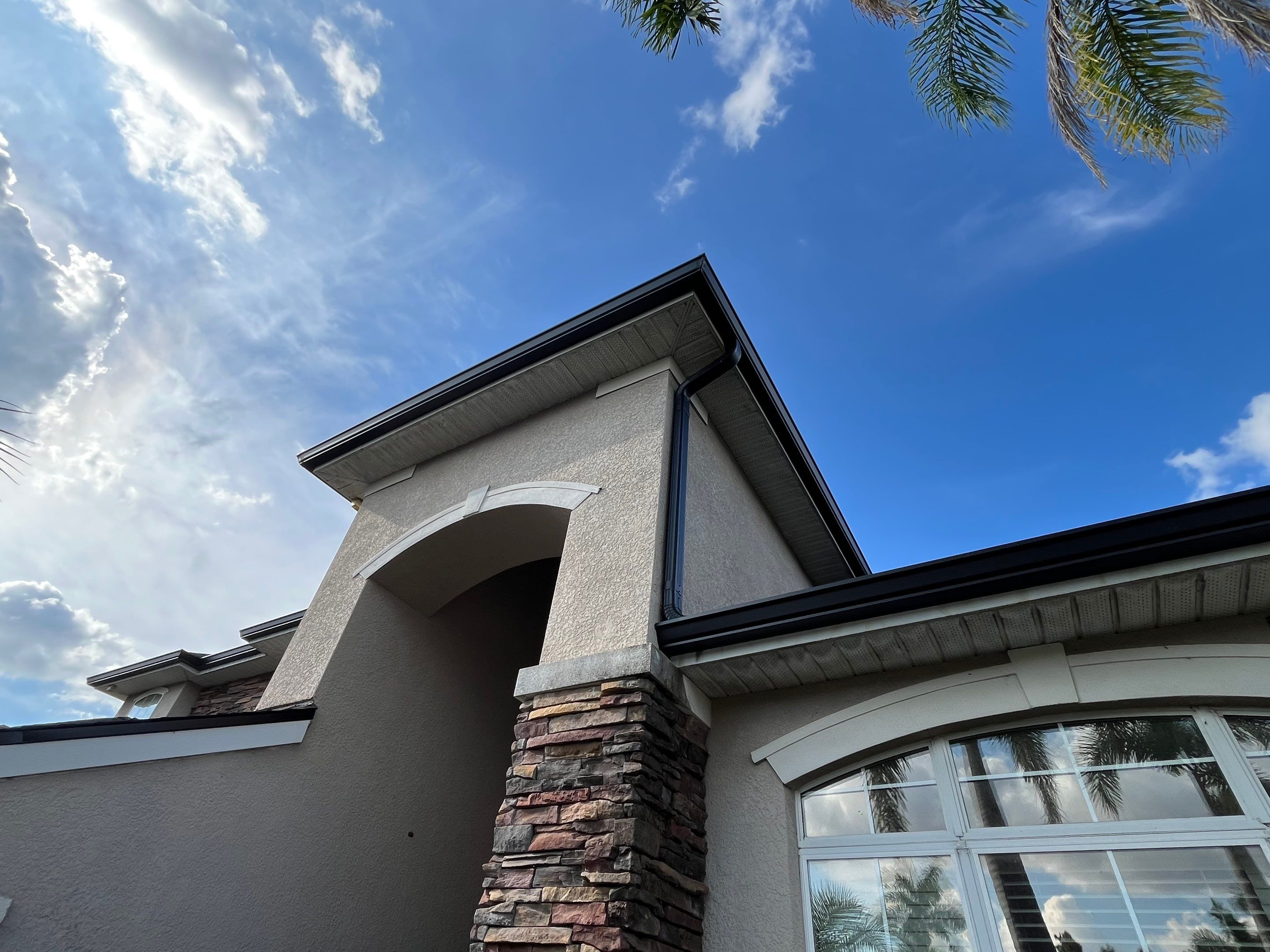 Black 6-inch Seamless Gutters for Modern Ellenton Homes FL by Gutter Professors