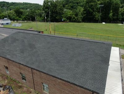 Commercial Roofing Installation using Performance Shingles