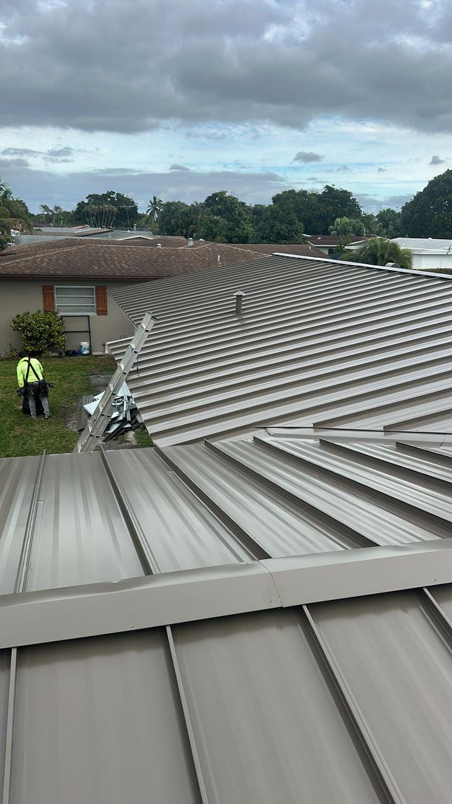 Residential Roofing Installation using Metal Roof  by City Roofing Inc