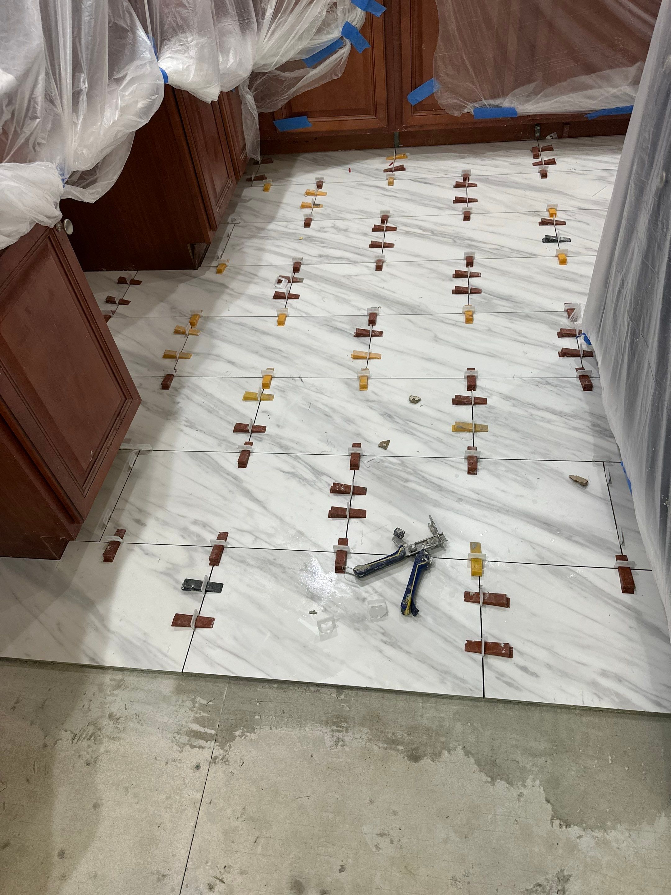 Kitchen floor refresh  by Footprints Floors of Nashville
