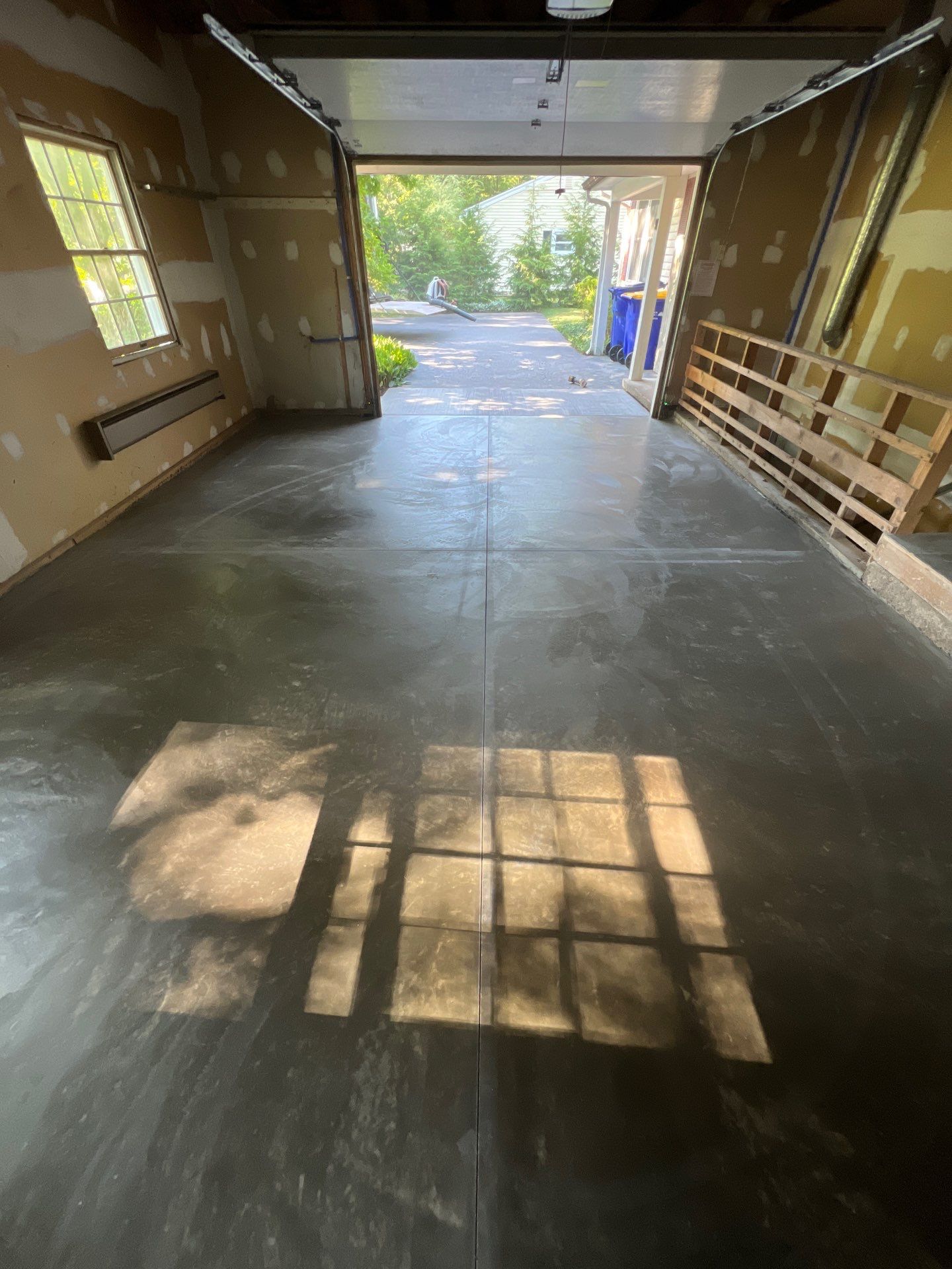Concrete garage floor replacement  by NG Masonry & Construction LLC