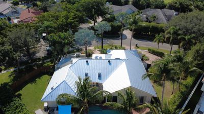 Residential Roofing Installation using 1" Nail strip metal roof