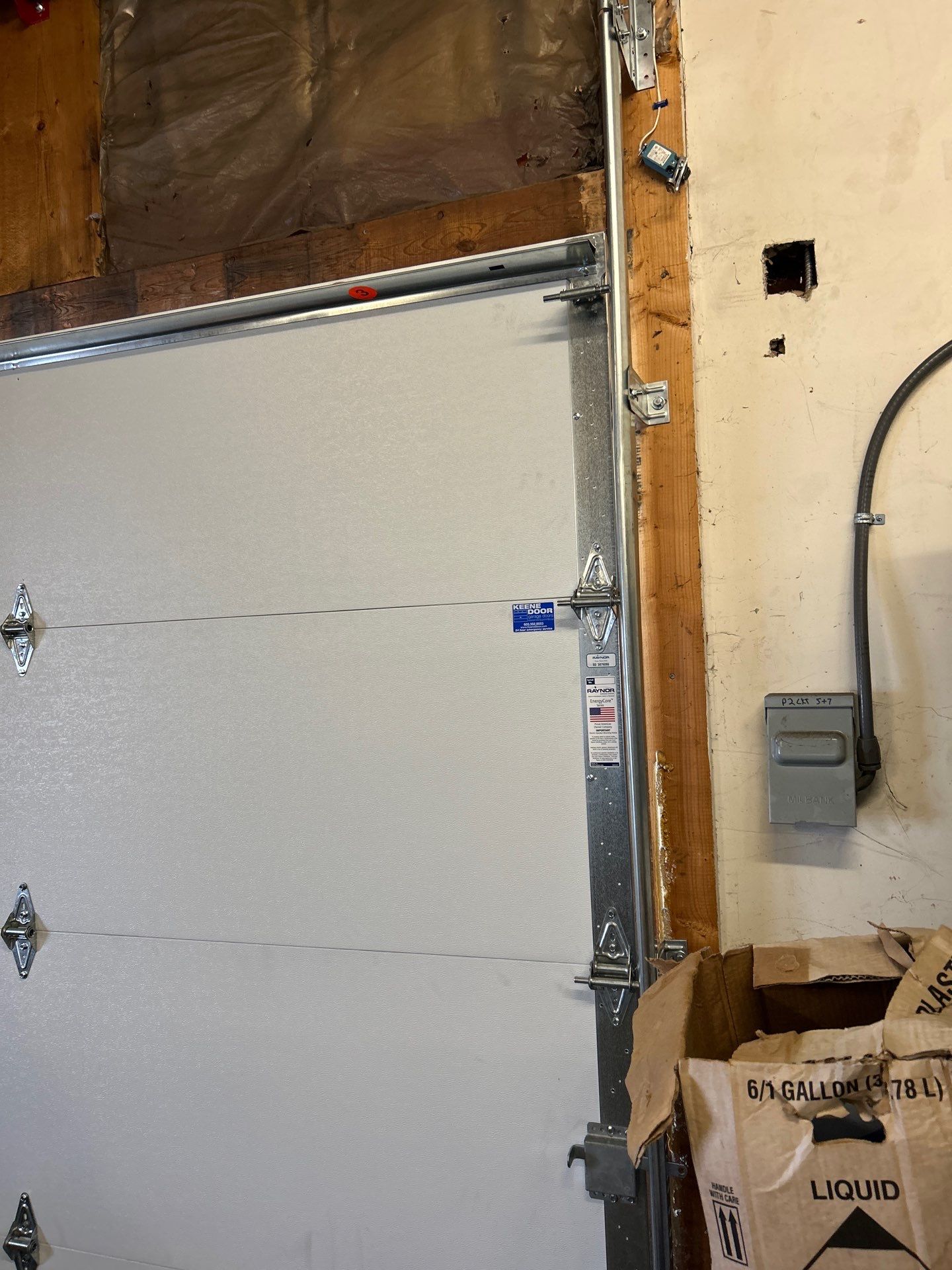 Door Installation using Raynor Energy Core Garage Door by Keene Door