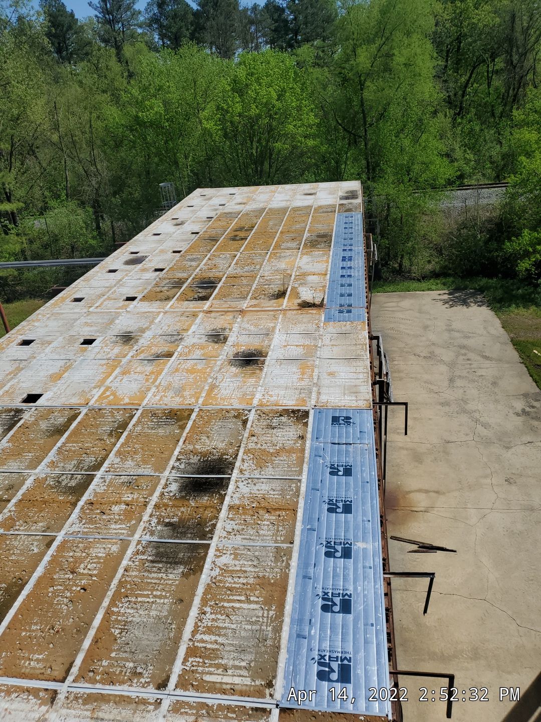 Commercial Roofing Installation using Aluminum Roofing panels by Hostetler Roofing