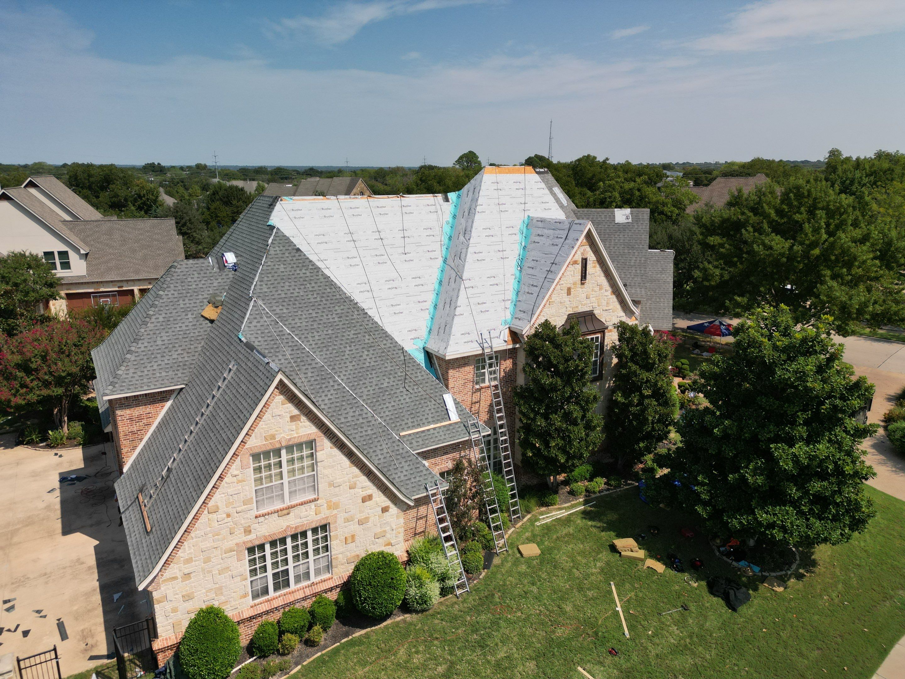 Southlake Texas Estate - Roof, Copper Awning and Gutter Project by First United Roofing & Construction