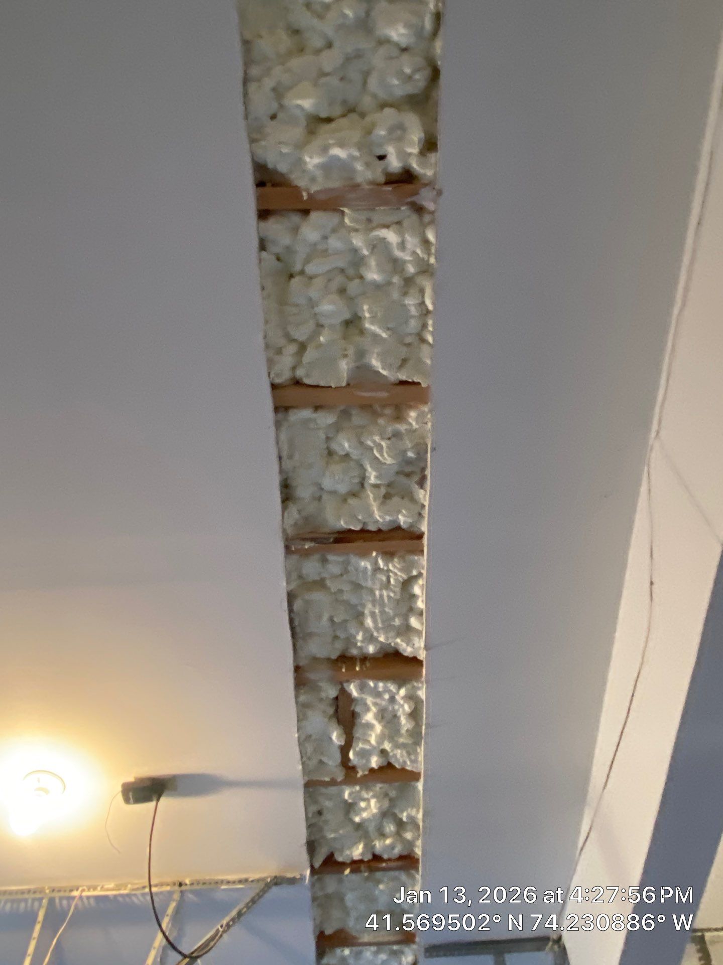 Garage ceiling using open cell spray foam by NYS Foam & Energy