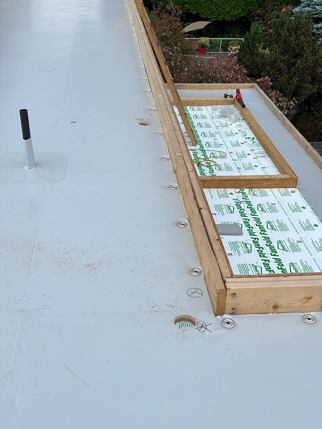 Residential Roofing Installation using Durolast roofing membrane by Top Notch Roofing Inc
