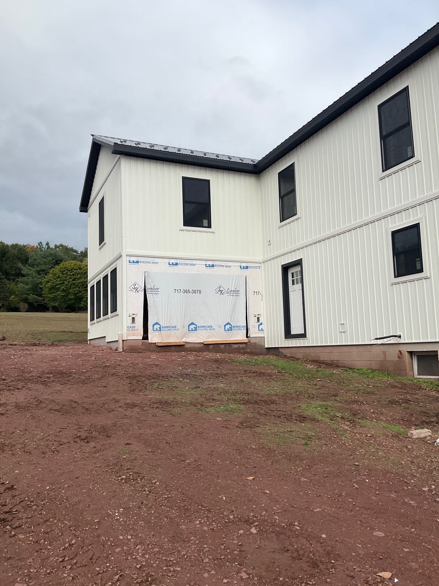 Two-Story Residential Addition and Exterior Transformation by Esh Builders