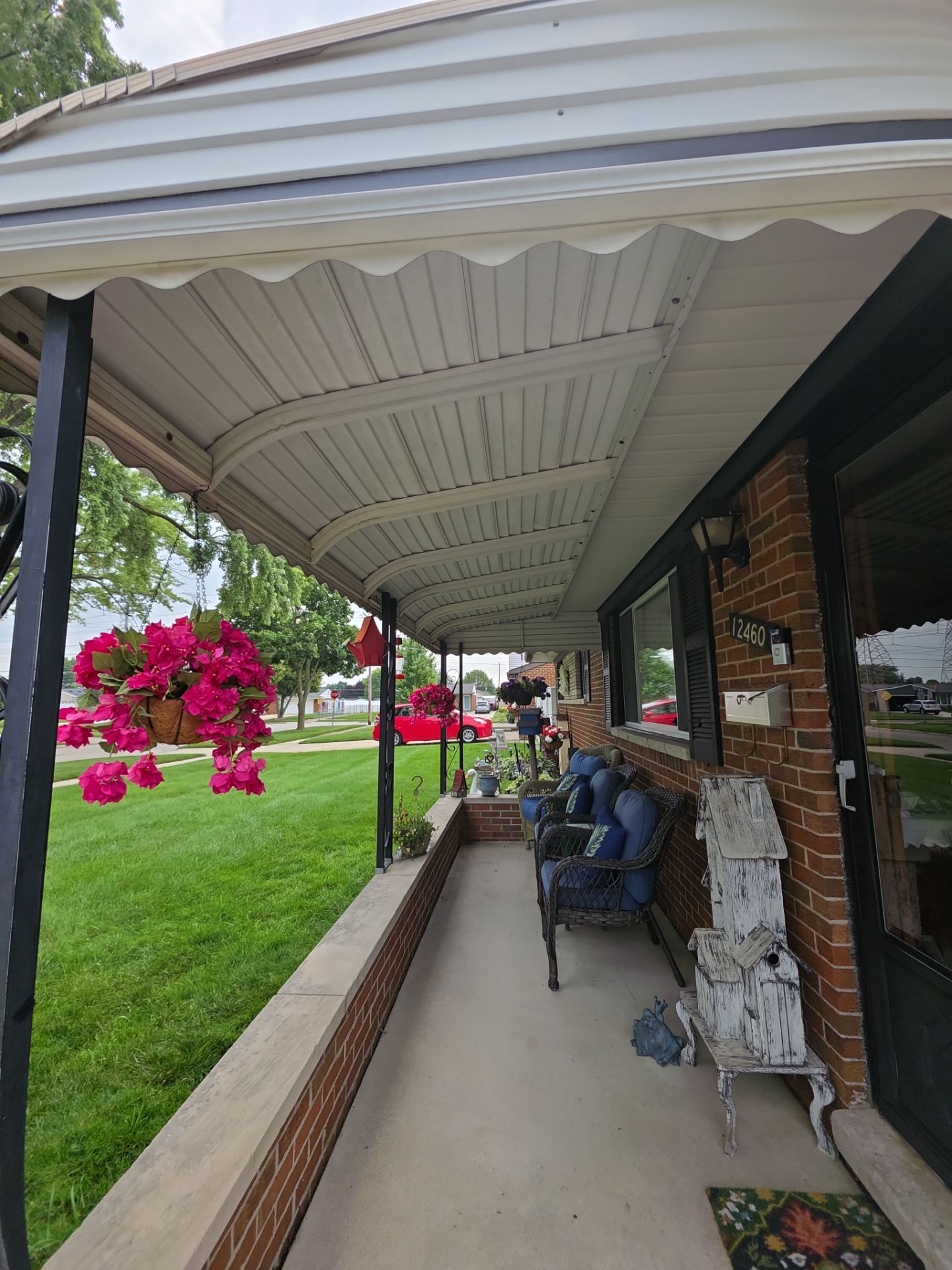 White Vinyl Siding and Gutter Installation in Sterling Heights by Top Shelf Painter