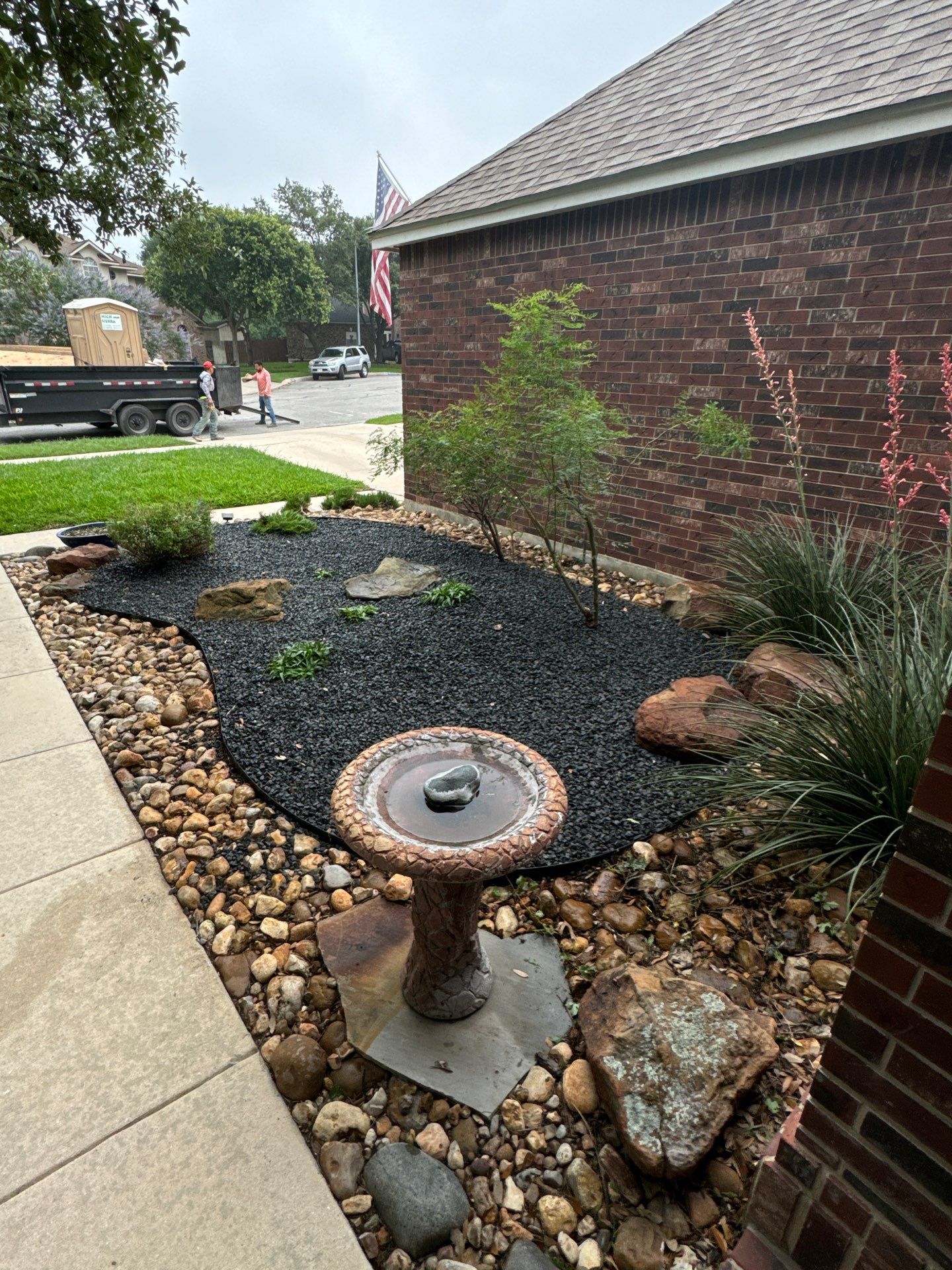 Landscaping Enhancement  using Texas Black Gravel by Hole In One Lawns, LLC