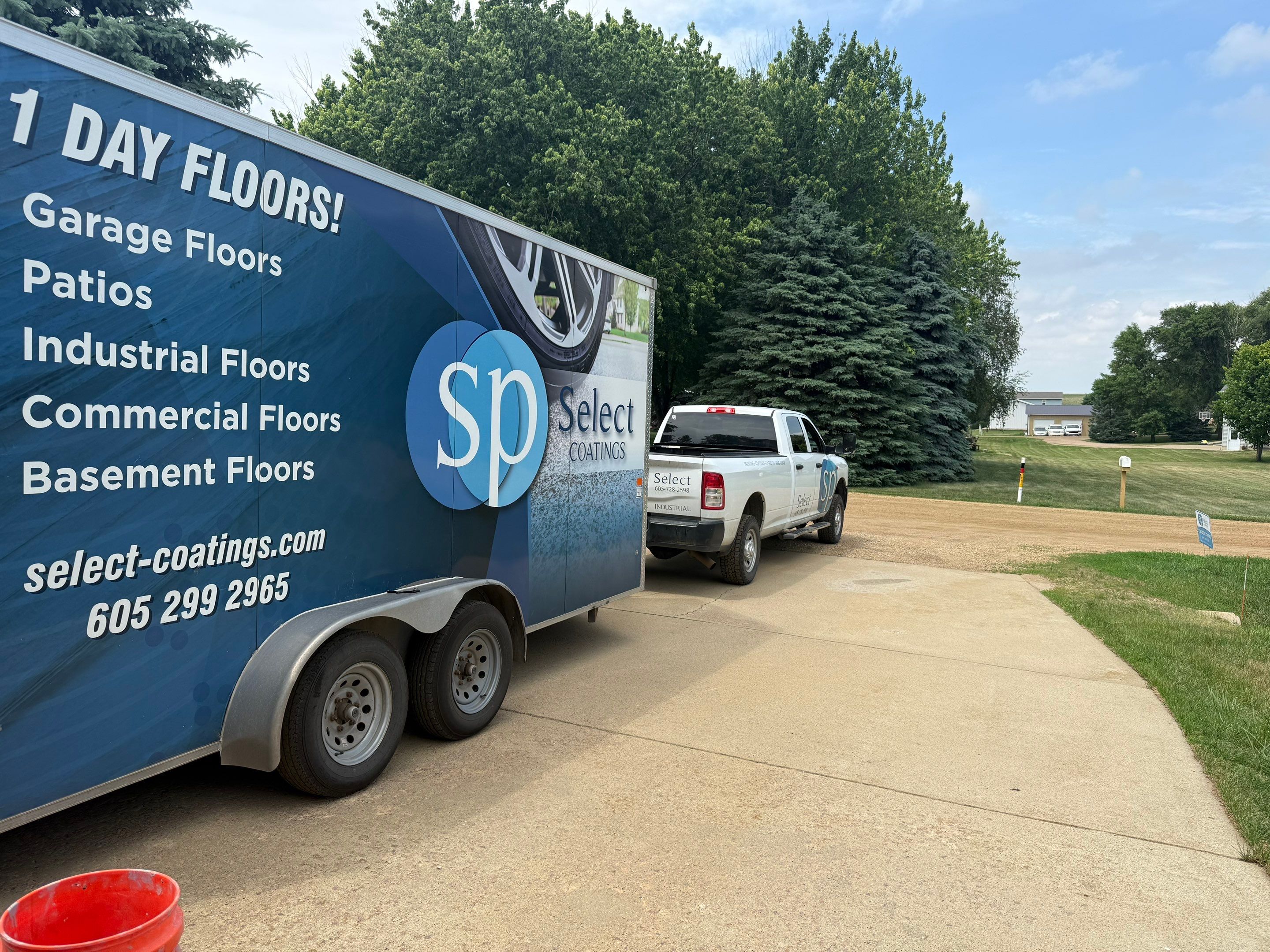 Full Garage Floor and Basement Stair Epoxy Coating in Sioux Falls by Select Painting, Coatings & Garage Cabinets