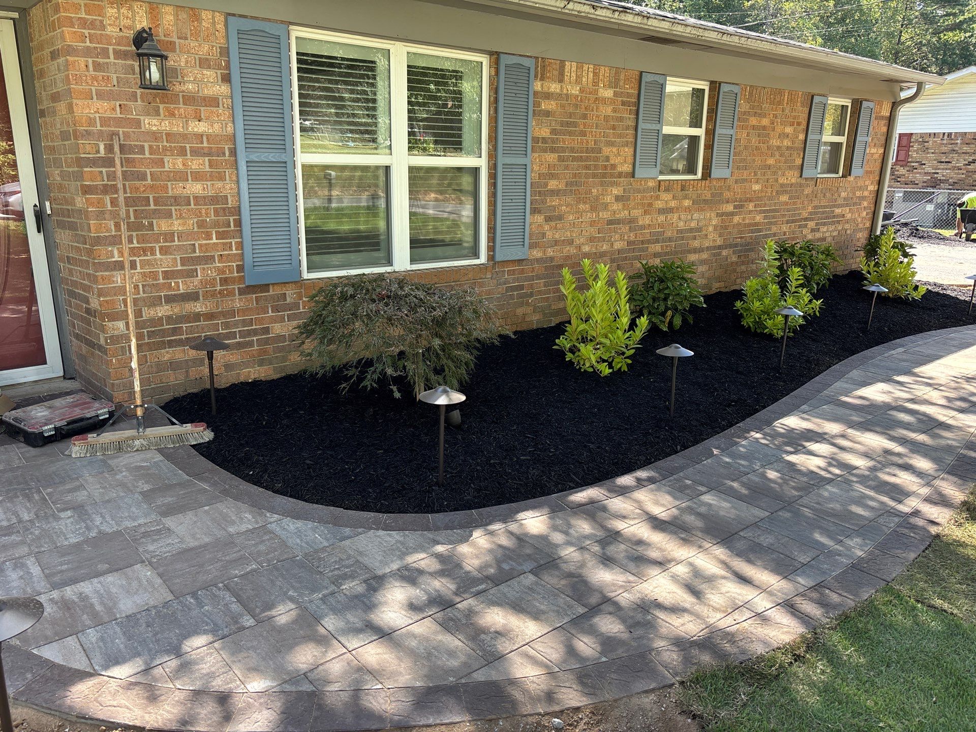 Front Entry Enhancements and a Back Deck Upgrade by Elite Proscapes LLC