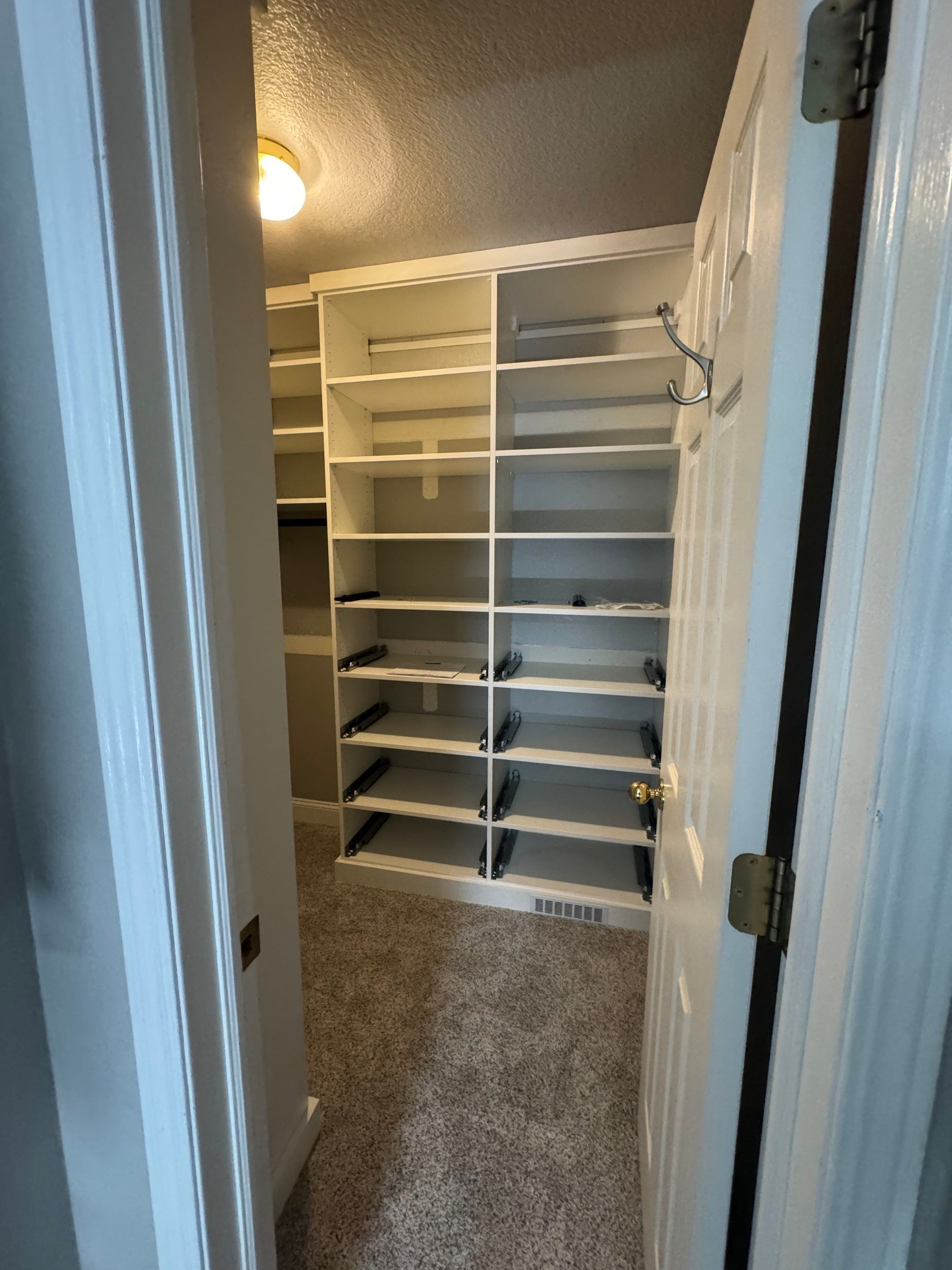 Custom Built-In and Primary Closet in Longmont by Concept 32, Inc.