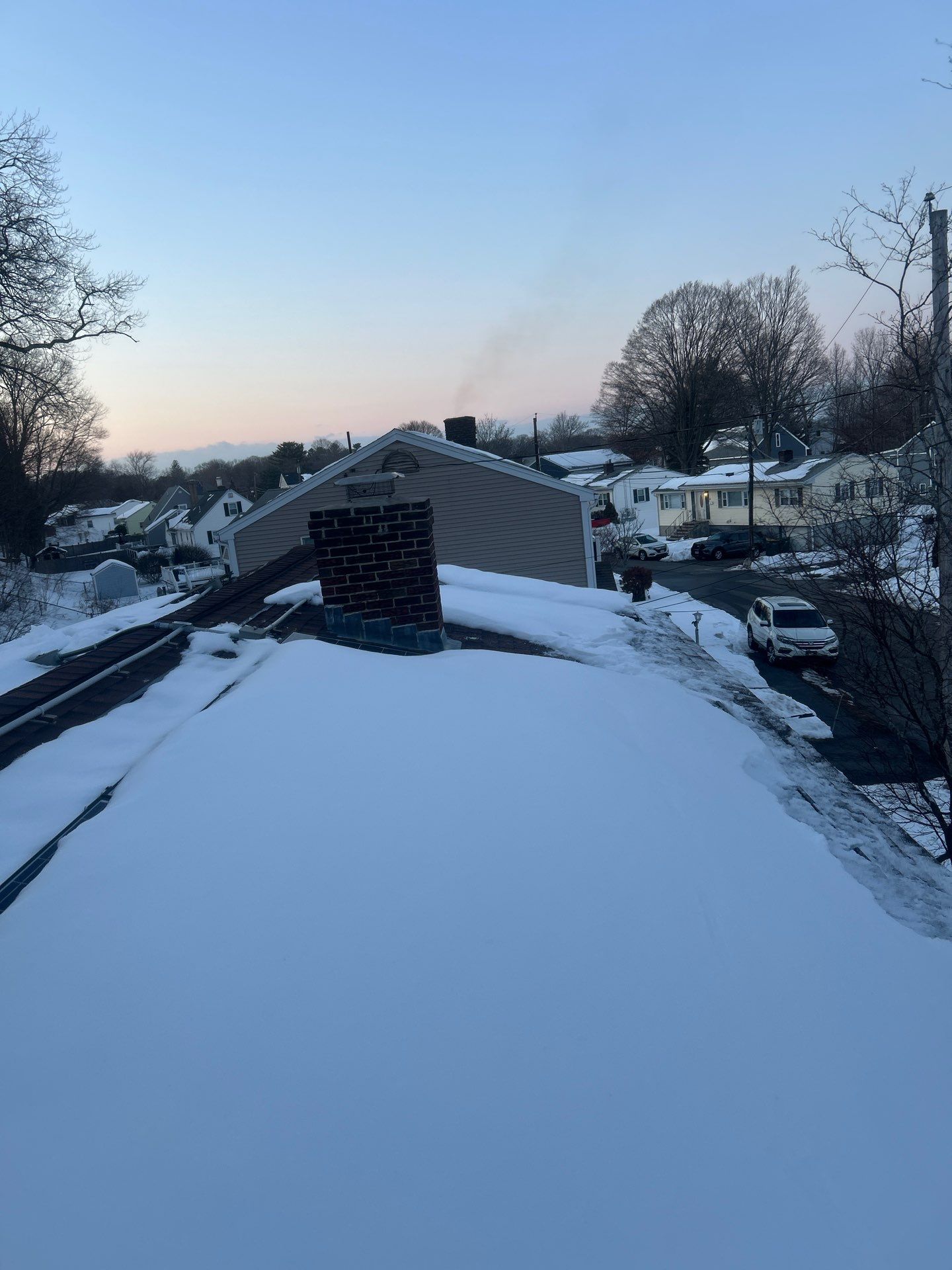 Ice Dam Removal & Snow Removal in Woburn, MA by Mighty Dog Roofing of Greater Middlesex County