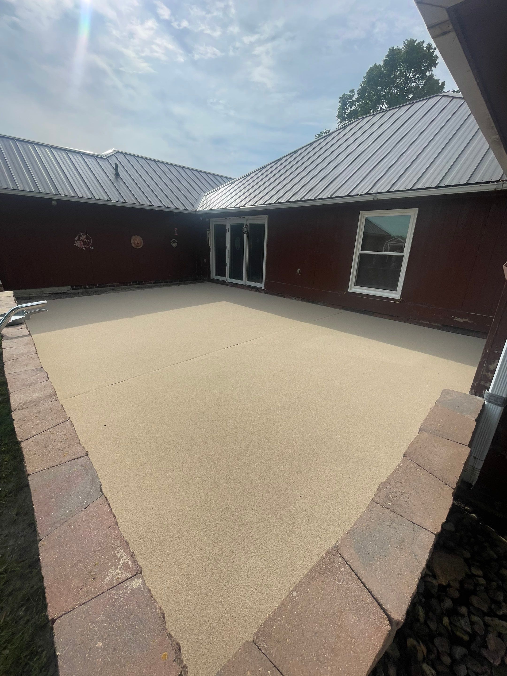 Concrete Patio Resurfacing and Protective Coating in Winfred, South Dakota by Select Painting, Coatings & Garage Cabinets