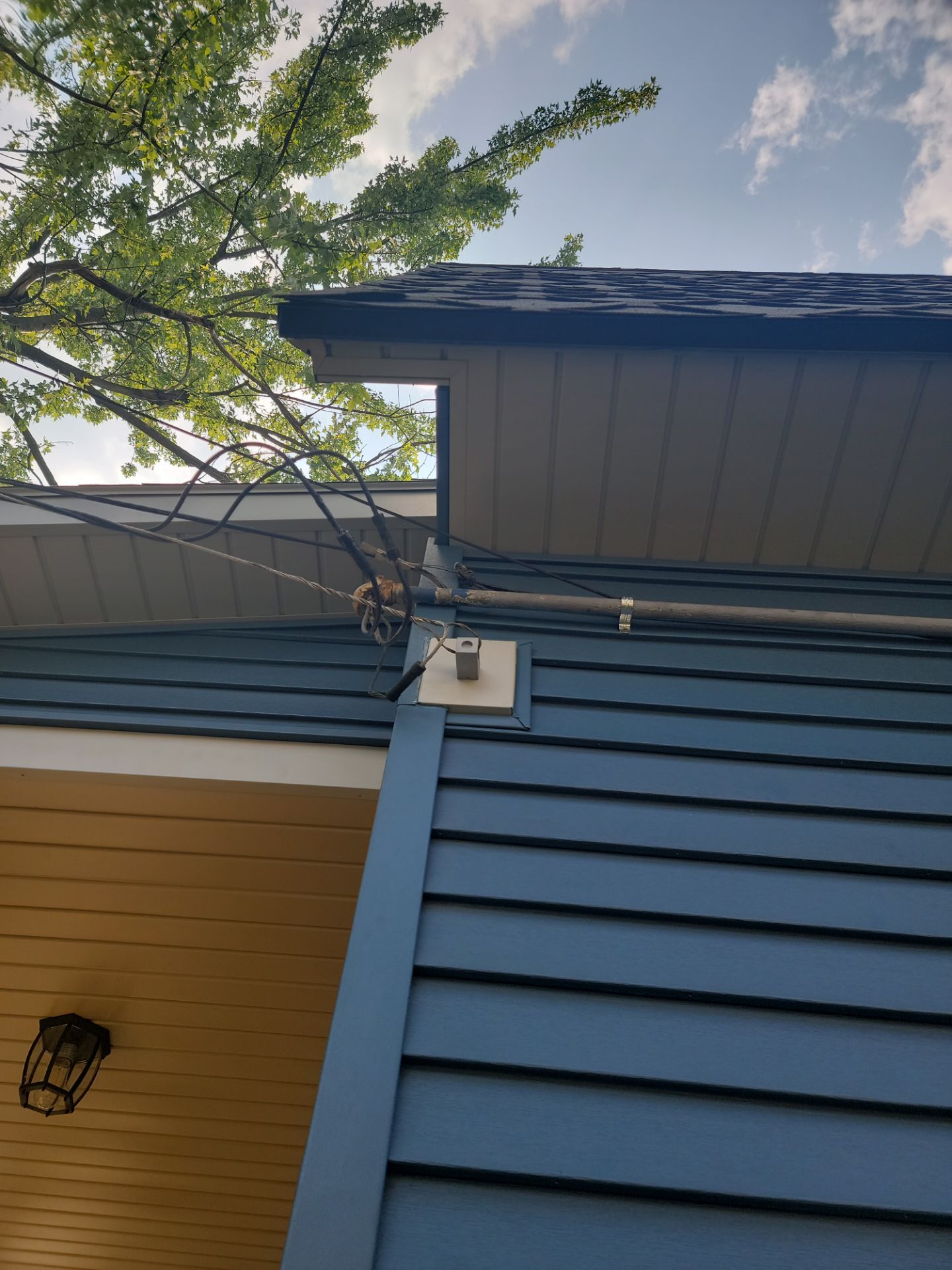 SIDING, DECK AND NEW PORCH  by Avalon Roofing and Exteriors