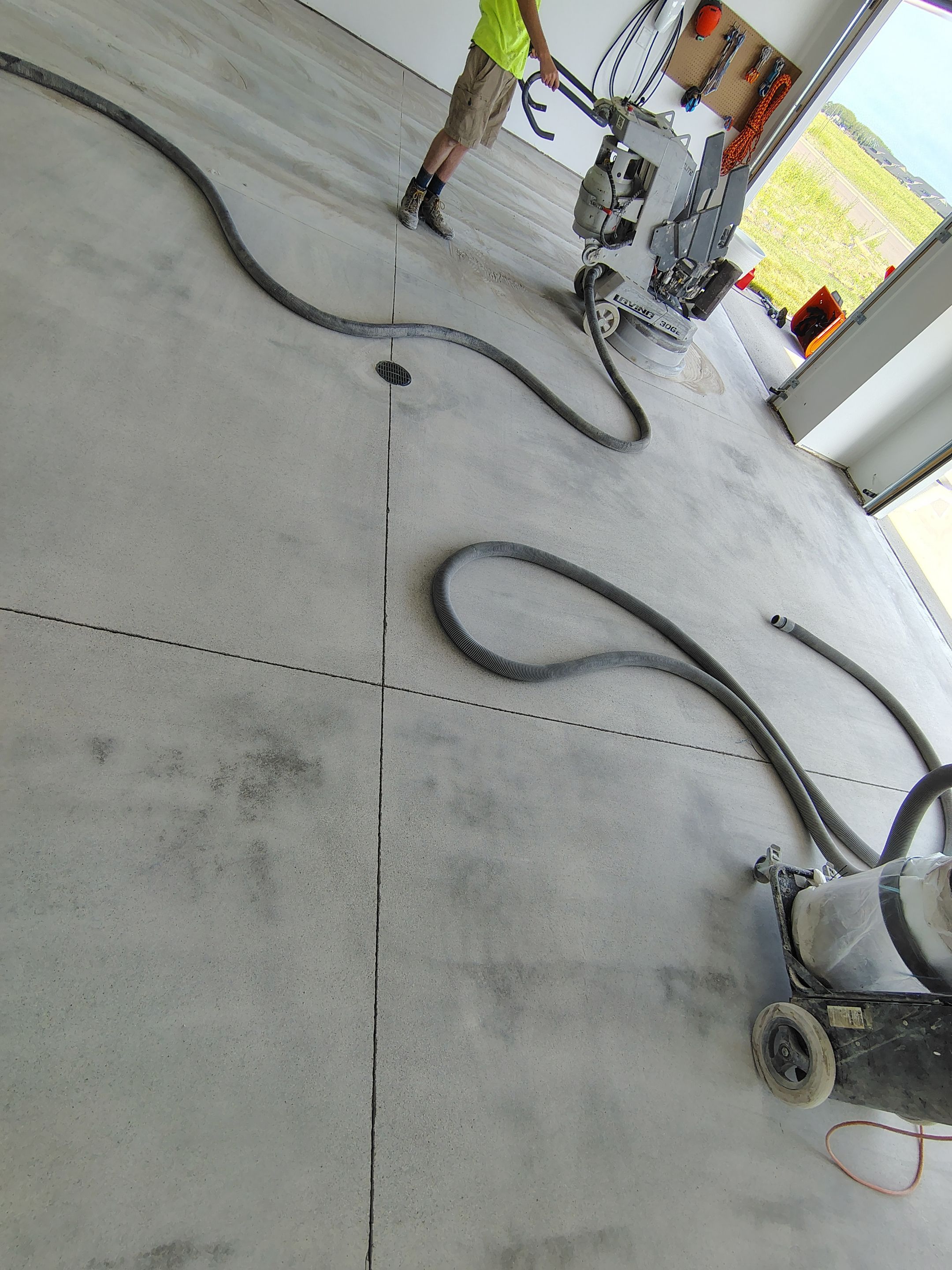 Gray and White Speckled Epoxy Garage Floor Coating in Tea by Select Painting, Coatings & Garage Cabinets