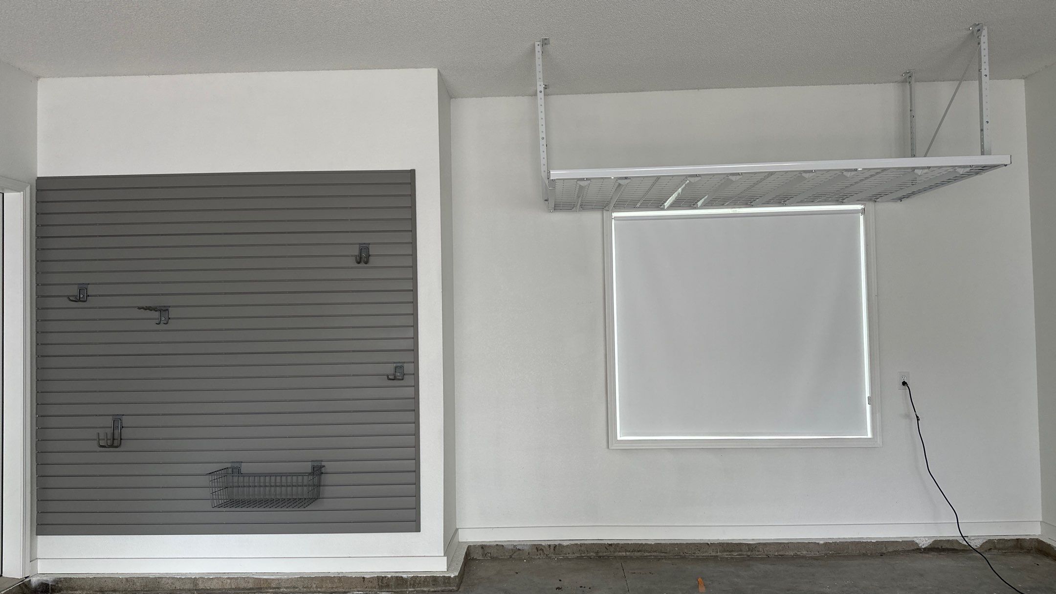 Brooke L. added cabinets for a clean storage look by Banner Garage