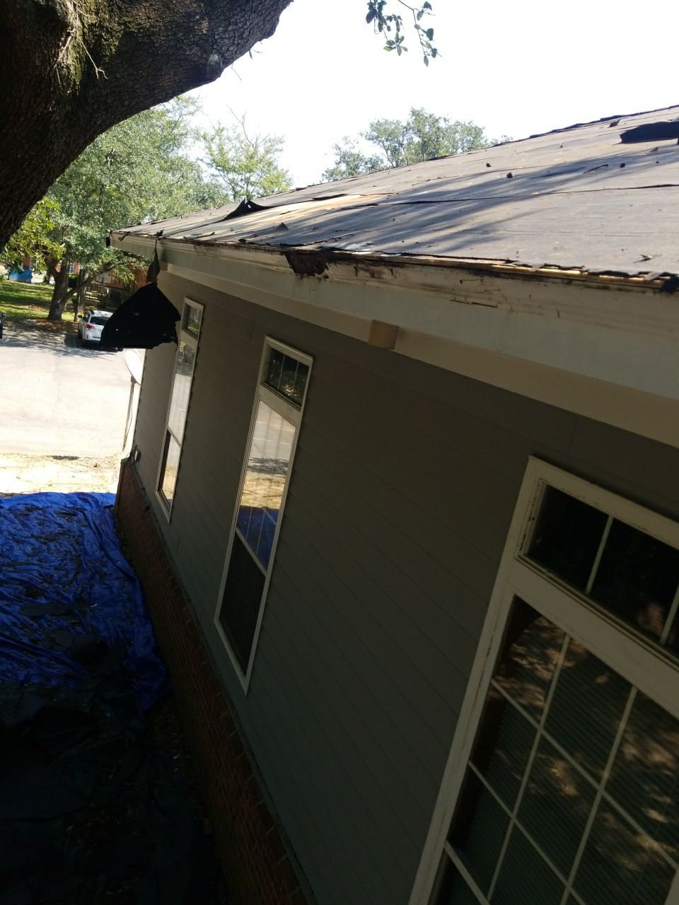 Residential Roofing Installation using Roof Replacement by American Roofing & Construction LLC