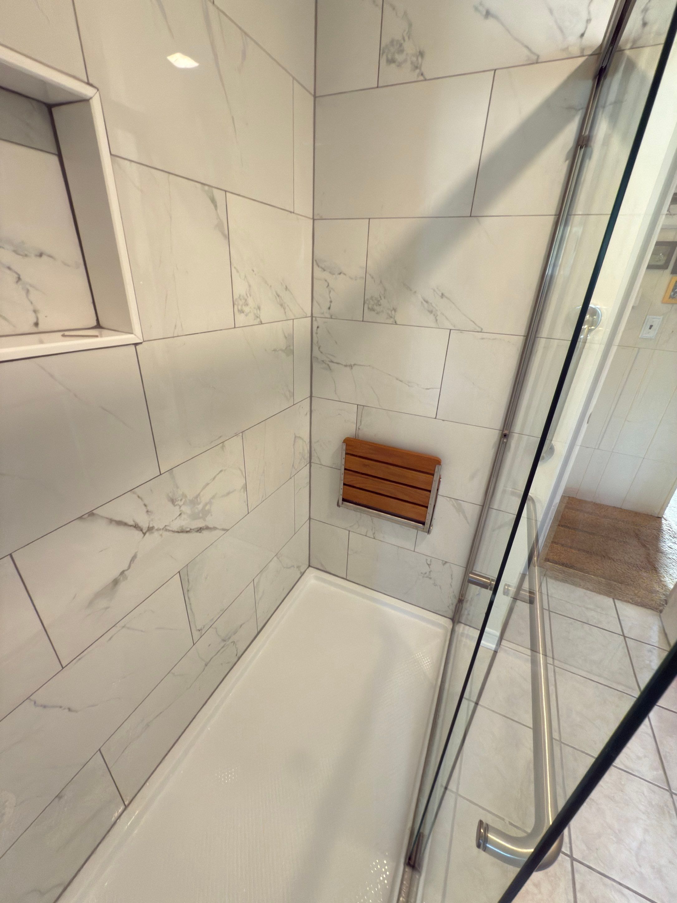 Bathroom Remodel using Tile by Home Concepts Construction