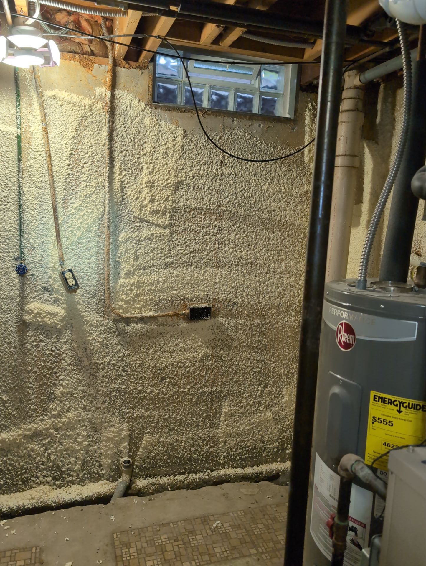 Interior Basement Waterproofing System and Egress Window Installation by Toledo Basement Repair 