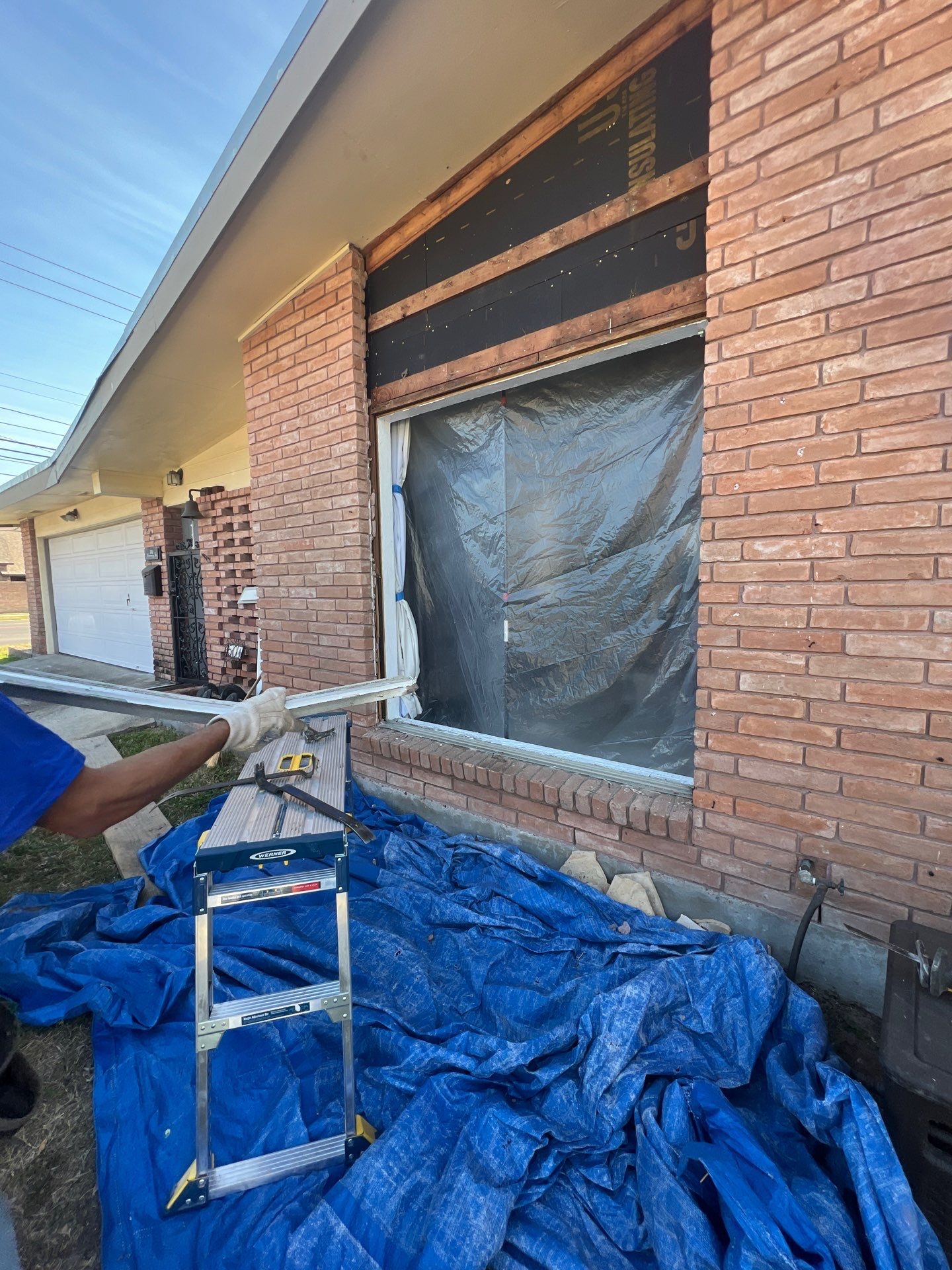 Windows in Brick with a Bay Window by Bayfront Roofing and Construction