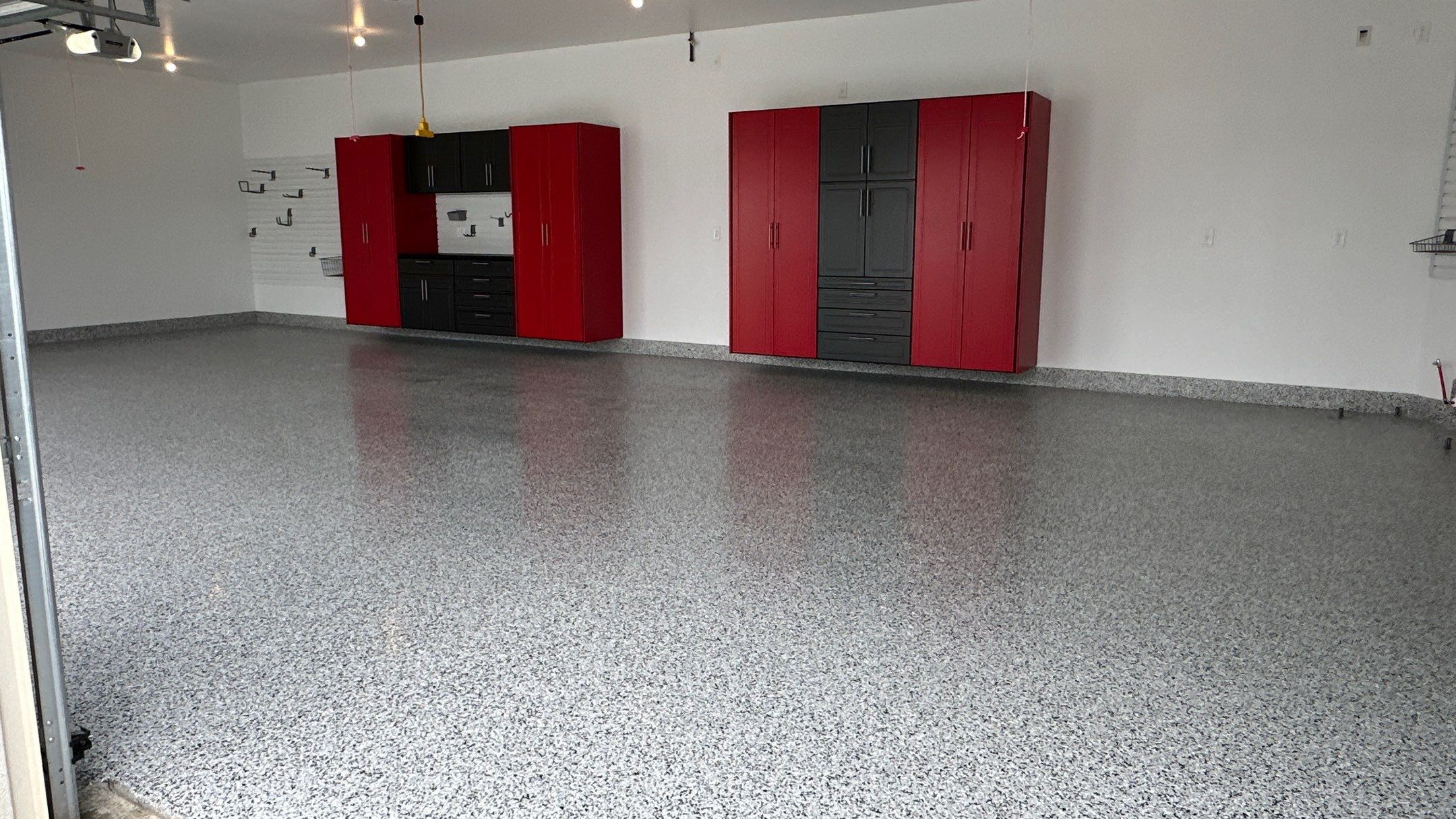 Louis P. transformed their garage into the garage of their dreams by Banner Garage