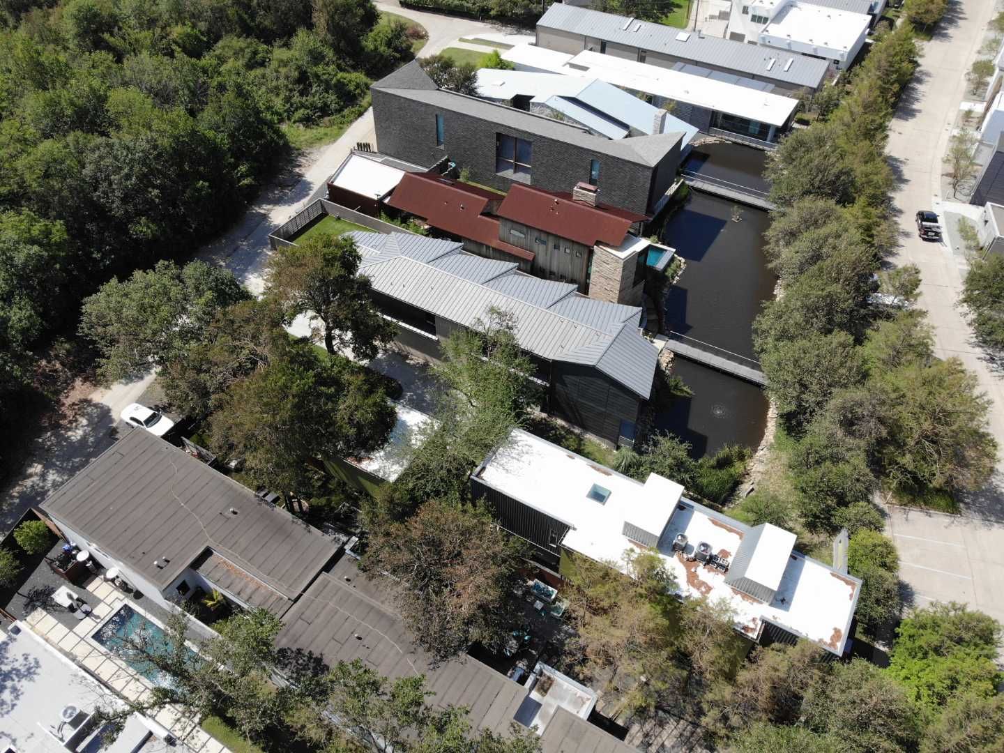 Metal Roofing project using MBCI Flexloc Panels - 22 gauge - silver metallic-in-color by Becker Roofing and Exteriors