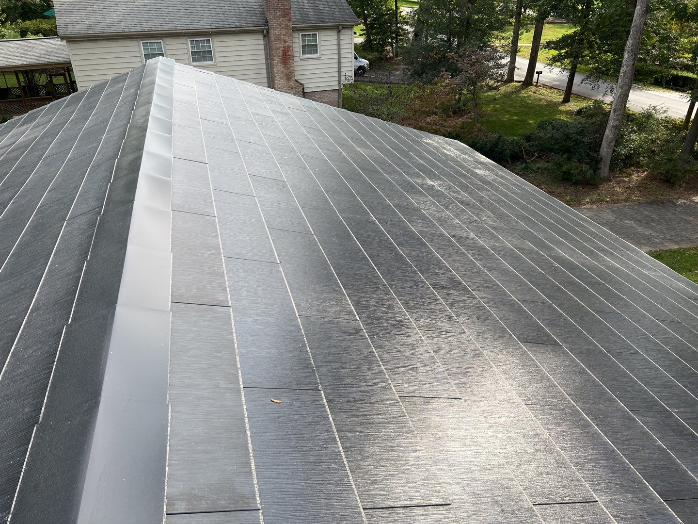 Tesla Solar Roof Replacement using Tesla Solar Roof V3 Tiles by American Home Contractors