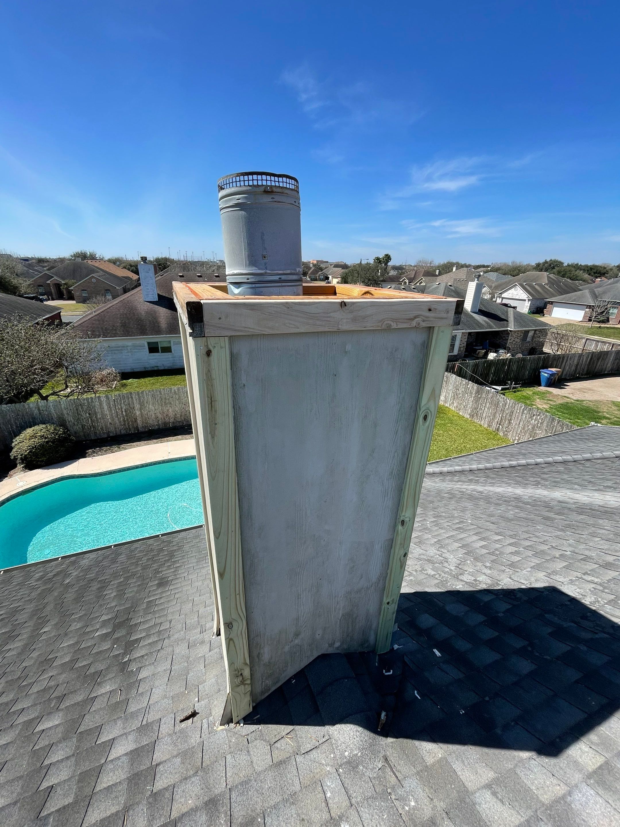 Residential Roofing Repair Replacing Chimney Cap by Lighthouse Roofing