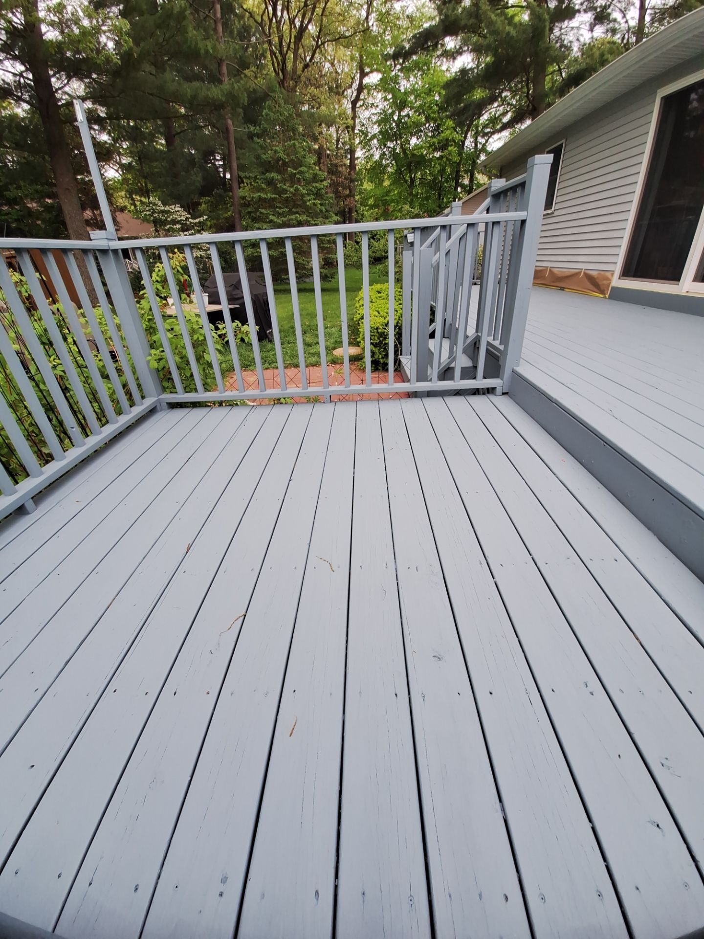 Repaint bedroom furniture, Pergola, and doors. Stain decking by Gordon Painting