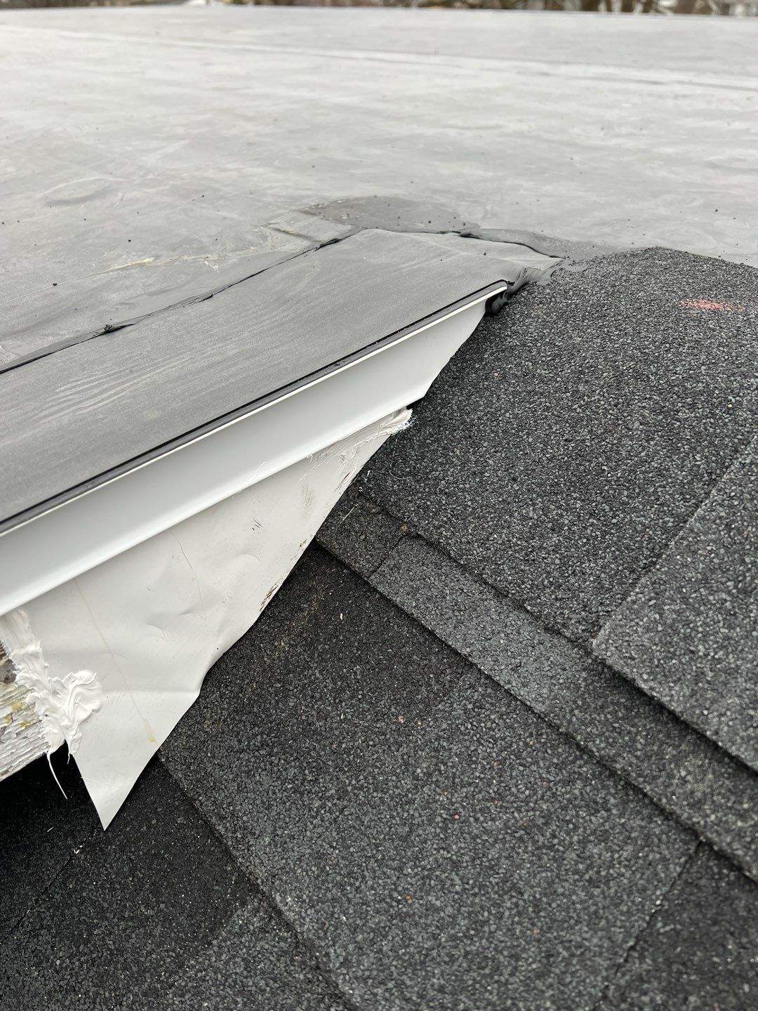 Residential Roofing Installation using 60 mil rubber roof by Nitro Roofing and Construction