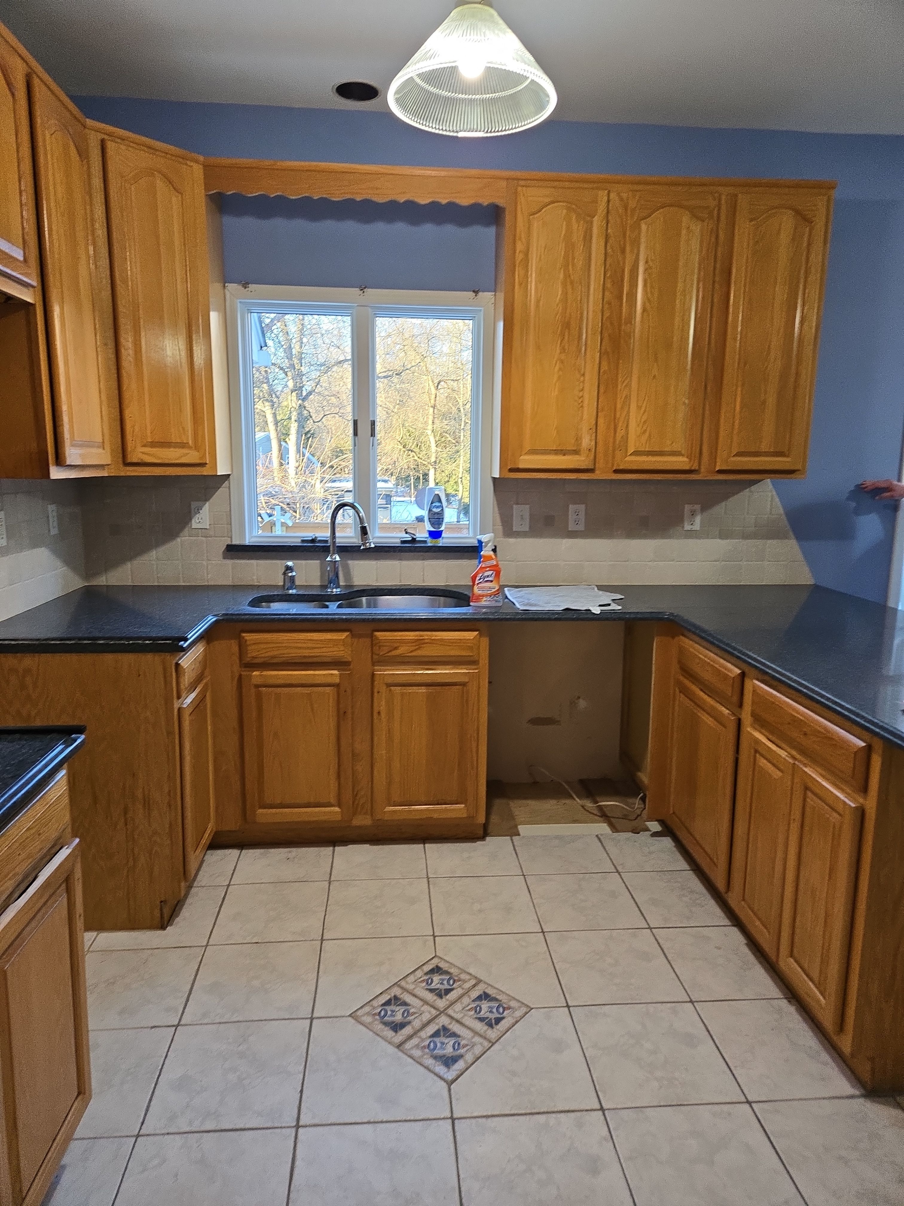Cabinet Refinishing using Benjamin Moore Command by Spectrum Painting, LLC