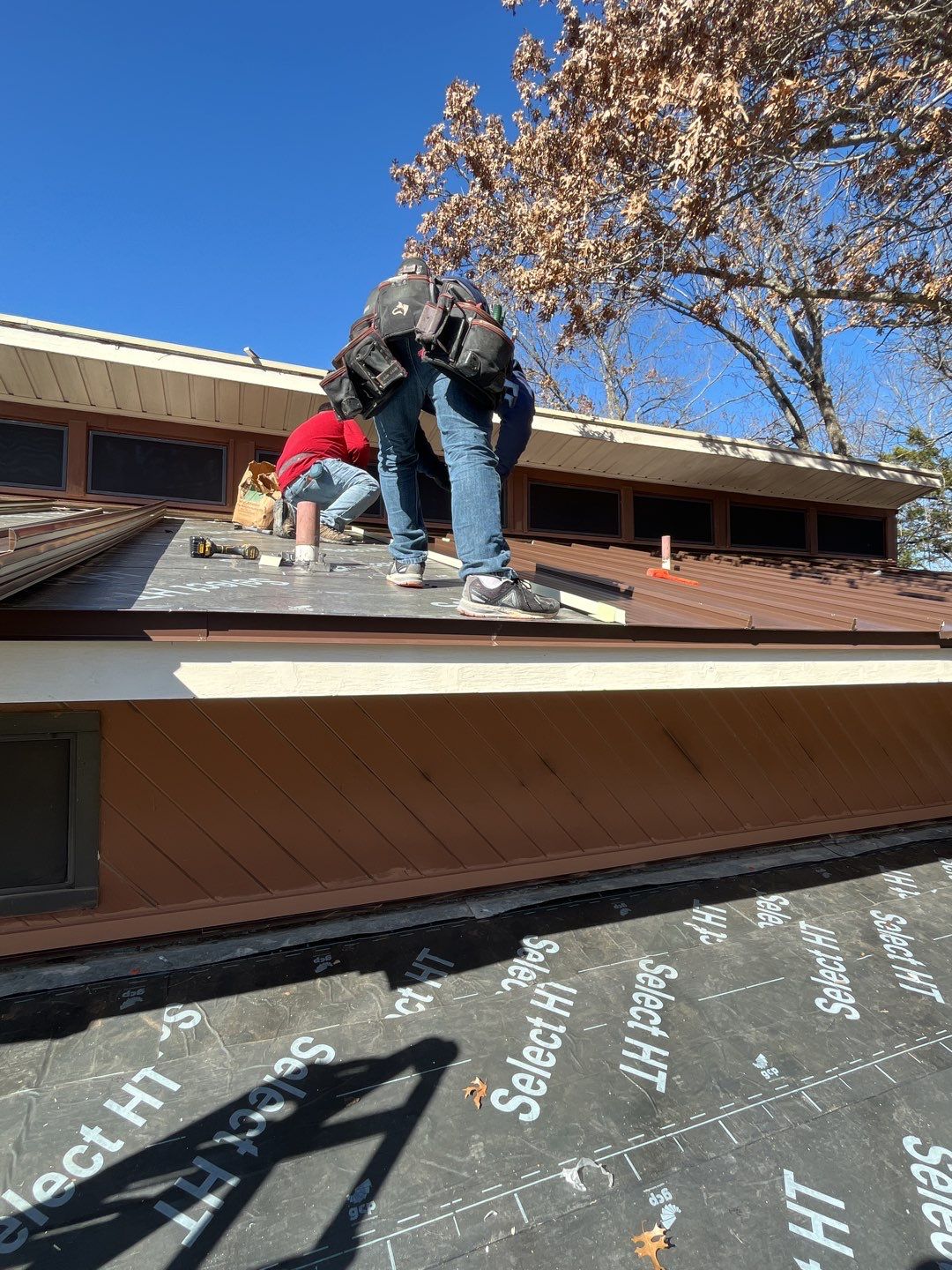 Residential Roofing Installation using Standing Seam Metal Roofing and Composition Shingles by Rainy Day Restoration