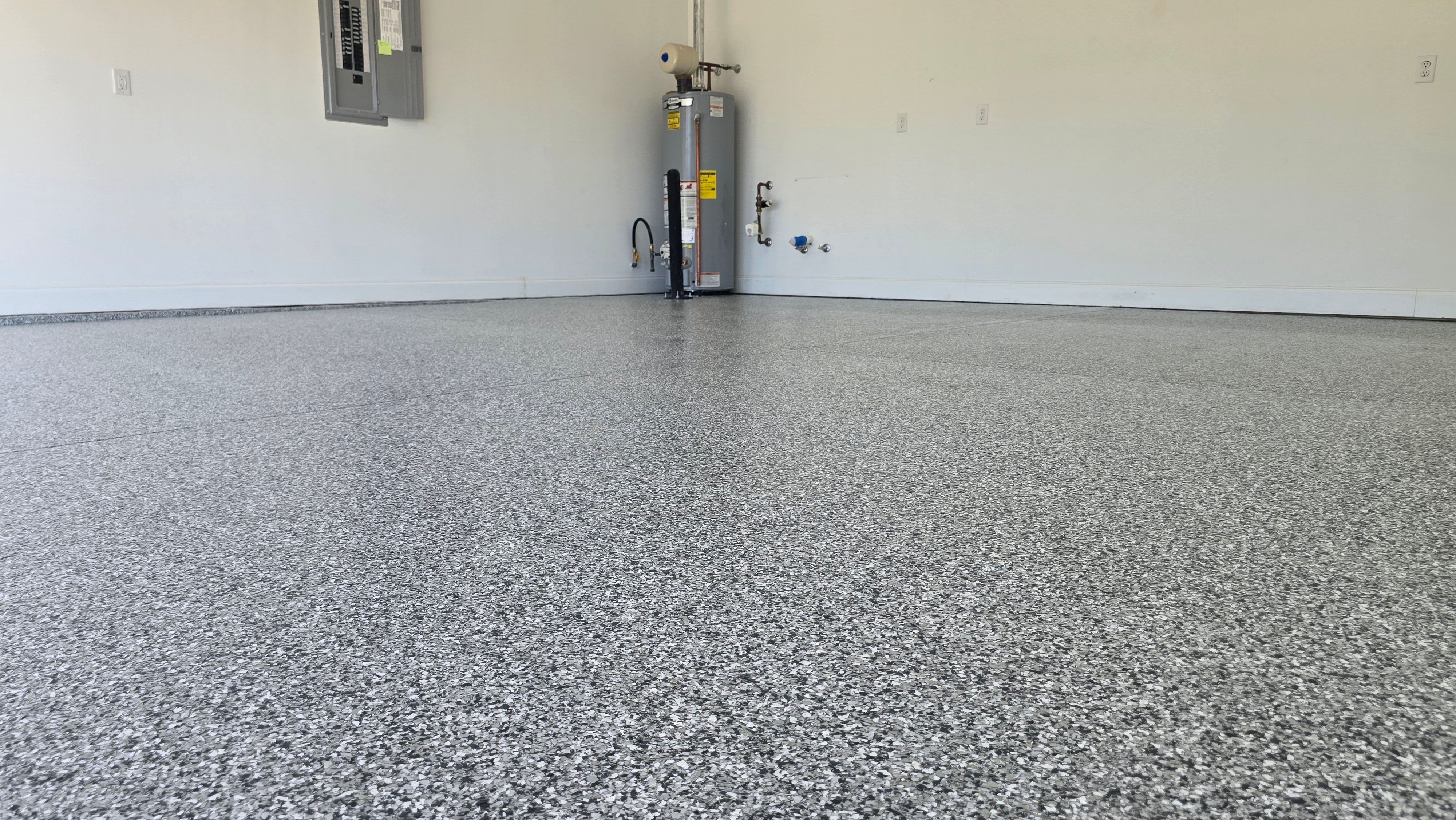 Porch, Patio, & Garage Completed Using Gravel by Elite Floor Solutions