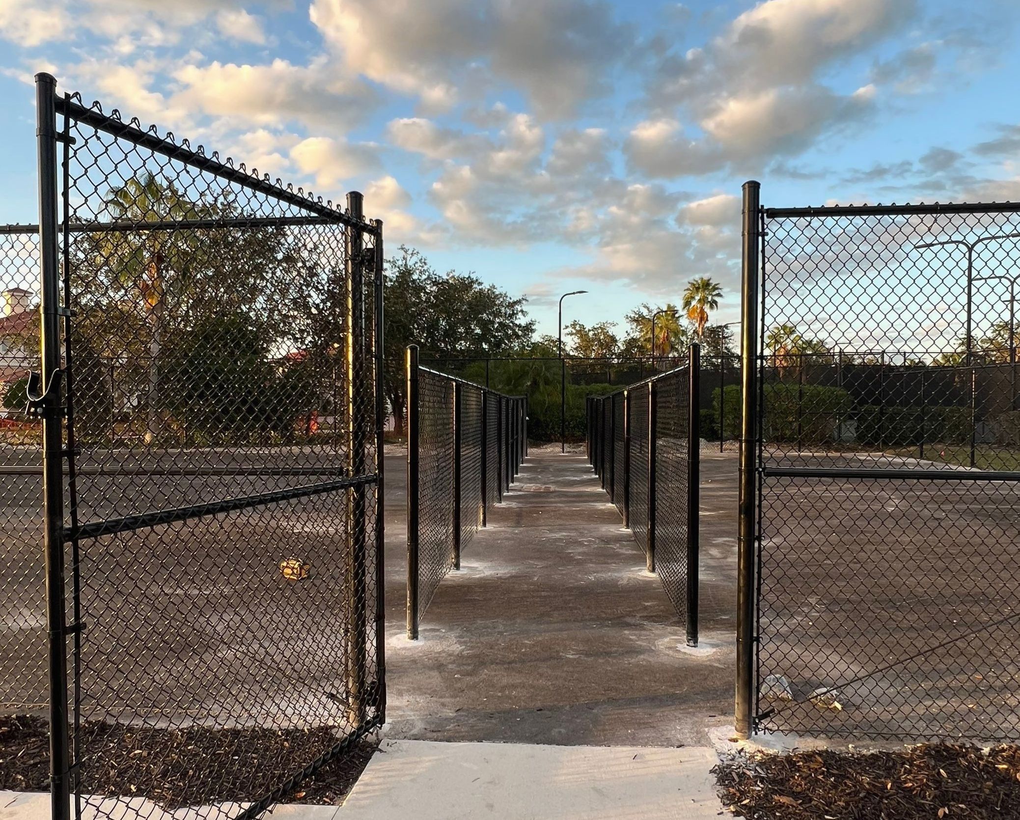 Chain-link Fence Installation using 8Ft Tall Black Chainlink Fence by Asap fence and gates, LLC