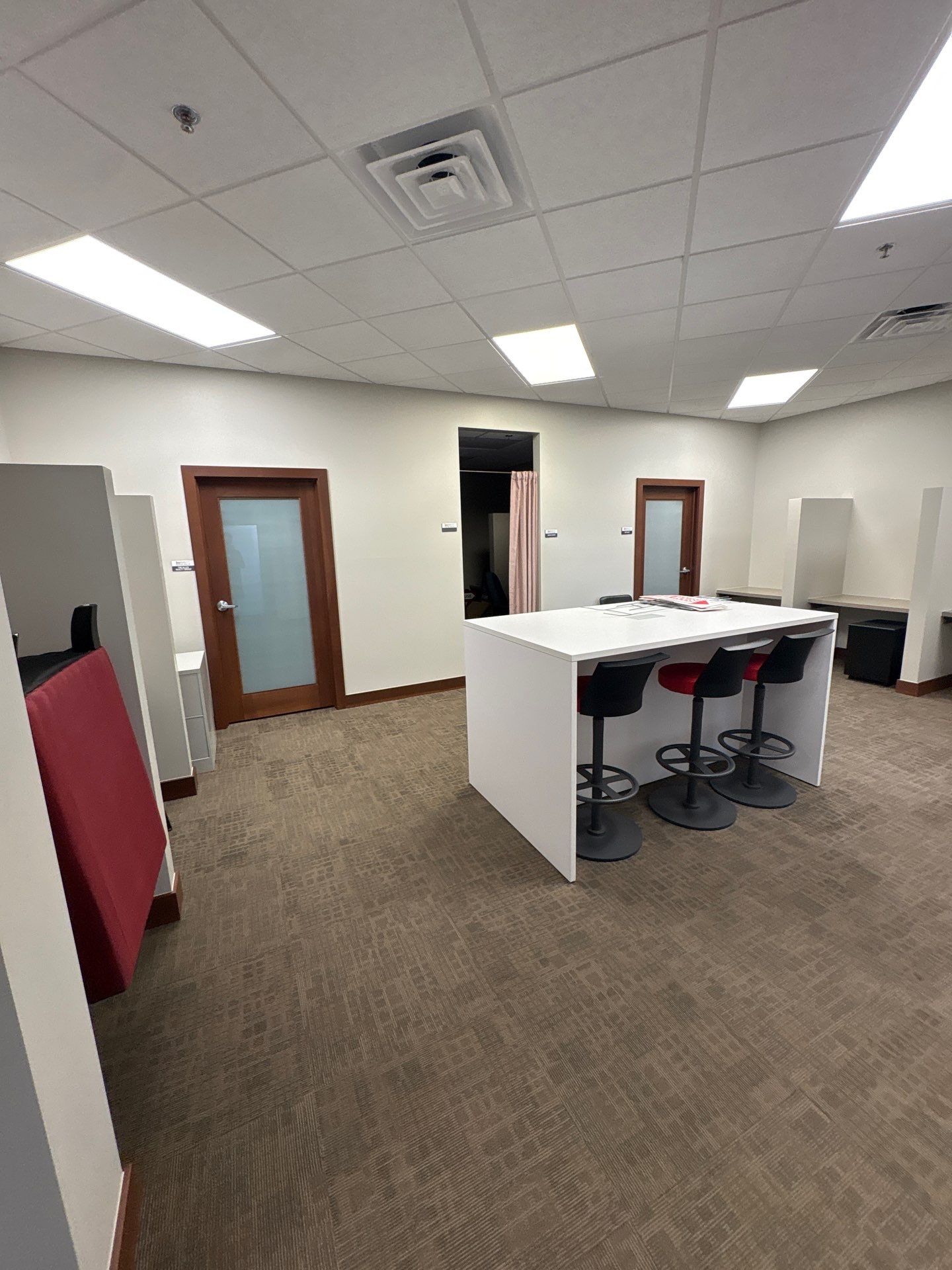 Commercial Office Interior Remodel and Modern Suite Refresh in Sioux Falls by Select Painting, Coatings & Garage Cabinets
