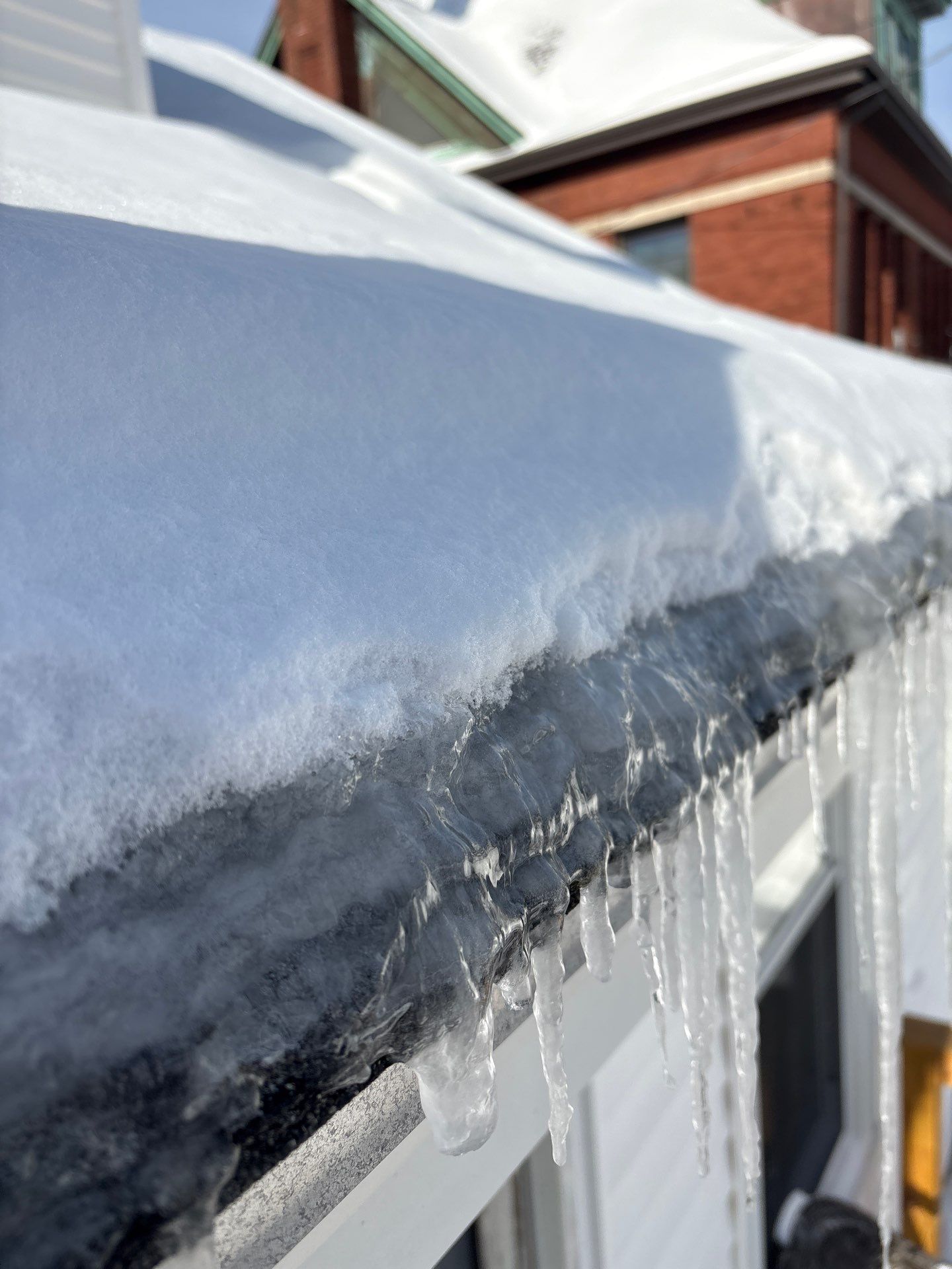 Emergency Snow Removal & Roof Tarp Installation in Lawrence, MA by Mighty Dog Roofing of Greater Middlesex County