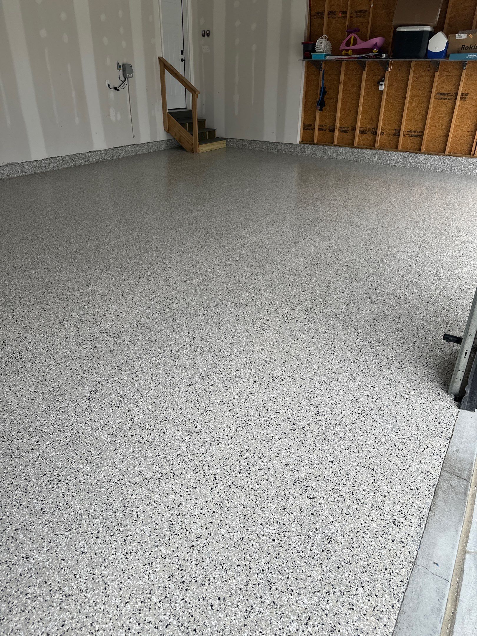 Three-Stall Garage Epoxy Floor Coating Installation in Lincoln by Goat Coatings