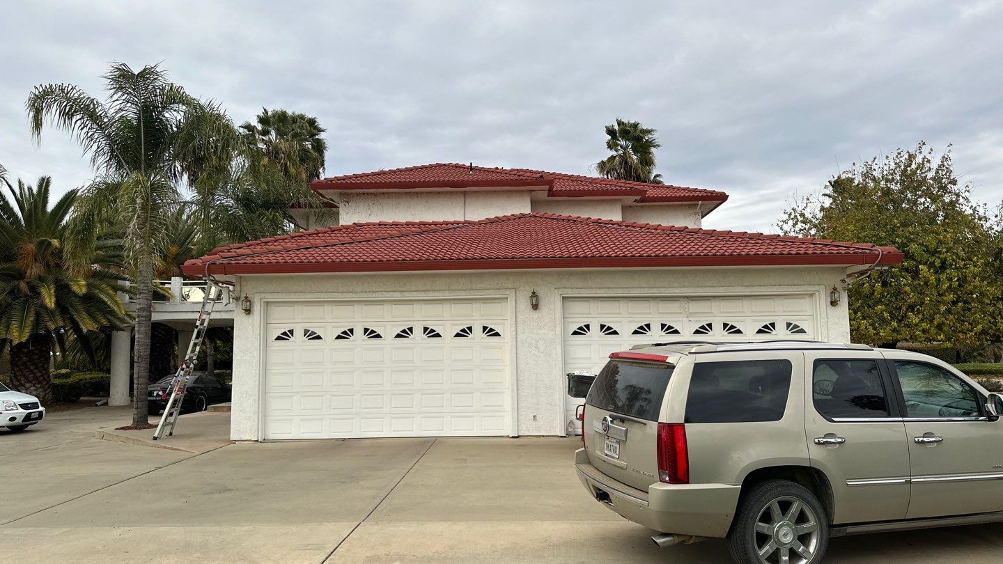 Tile refurbish project using existing tiles and replaced underlayment and battens by Straight Edge Roofing Inc