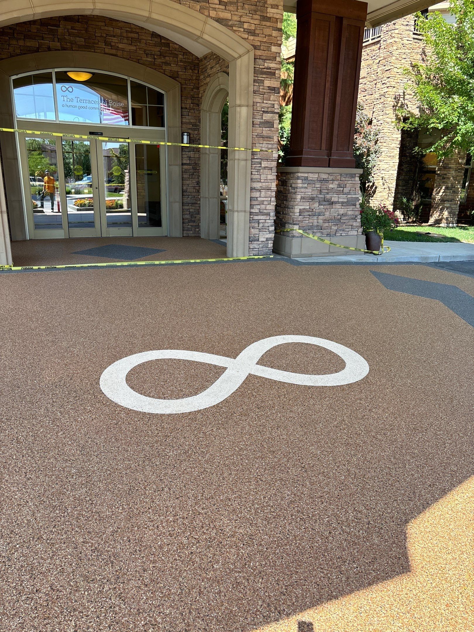 Custom Logo Inlay for Retirement Village by Mr. Mudd Concrete