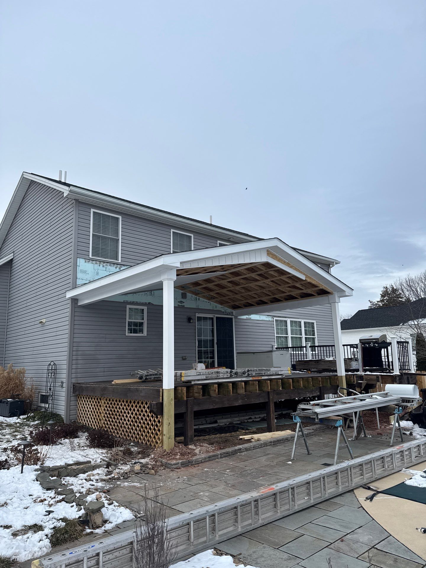 Custom Gable Porch Roof Addition Over Existing Deck in Halifax by Esh Builders
