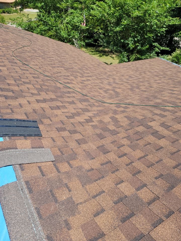 Residential Roofing Repair using Roof Replacement by American Roofing & Construction LLC