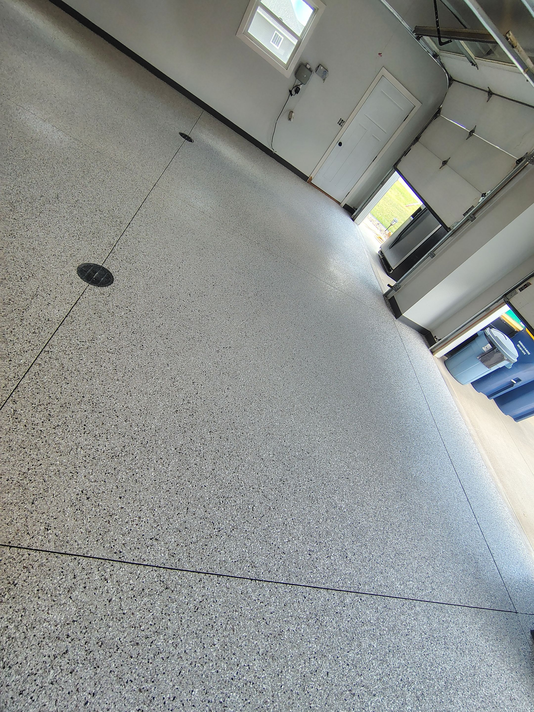 Multi-Car Garage Concrete Coating and Crack Repair in Dell Rapids by Select Painting, Coatings & Garage Cabinets