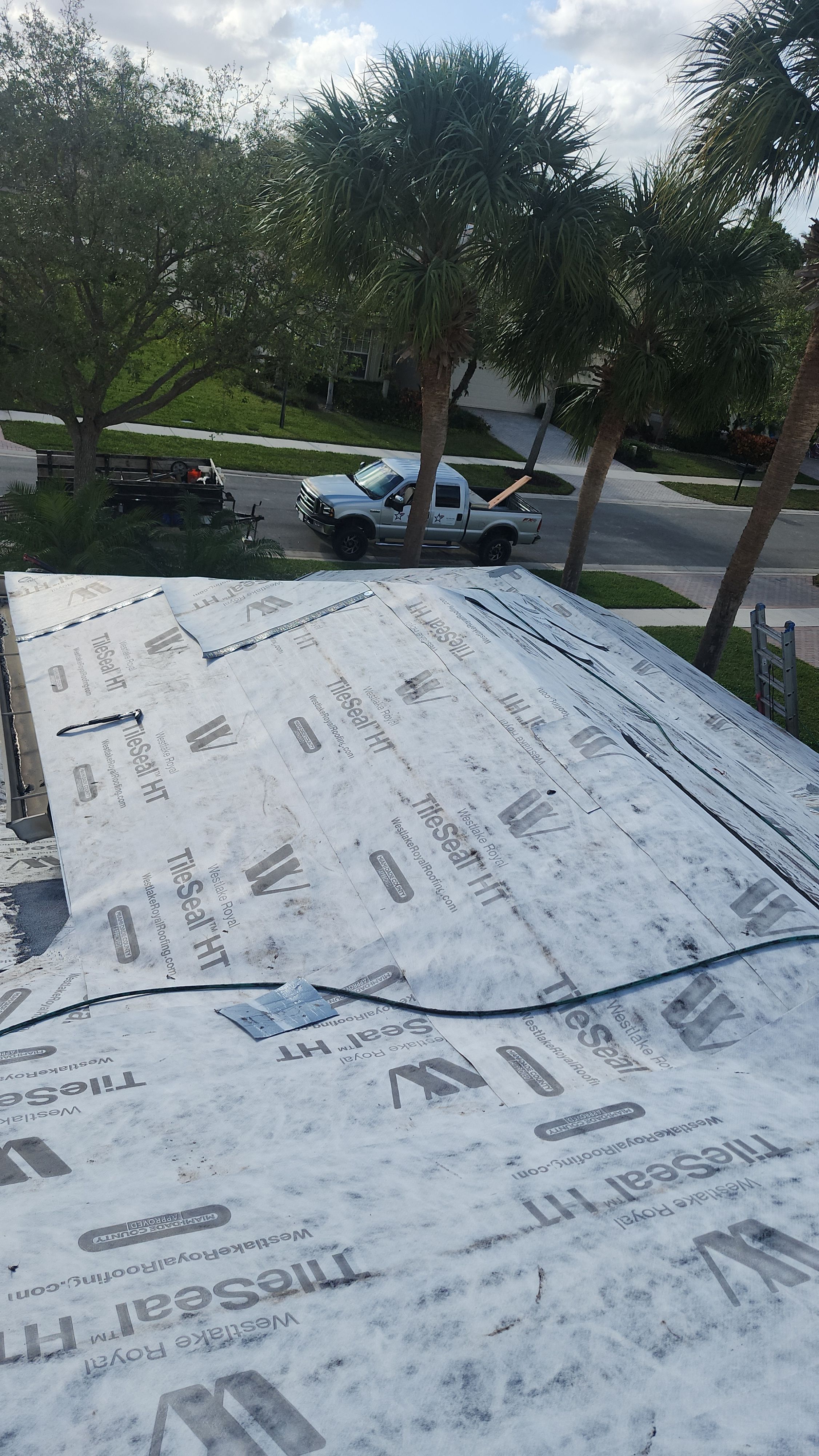 Full Concrete S-Tile Roof Replacement and Deck Repair in Wellington by Aastro Roofing
